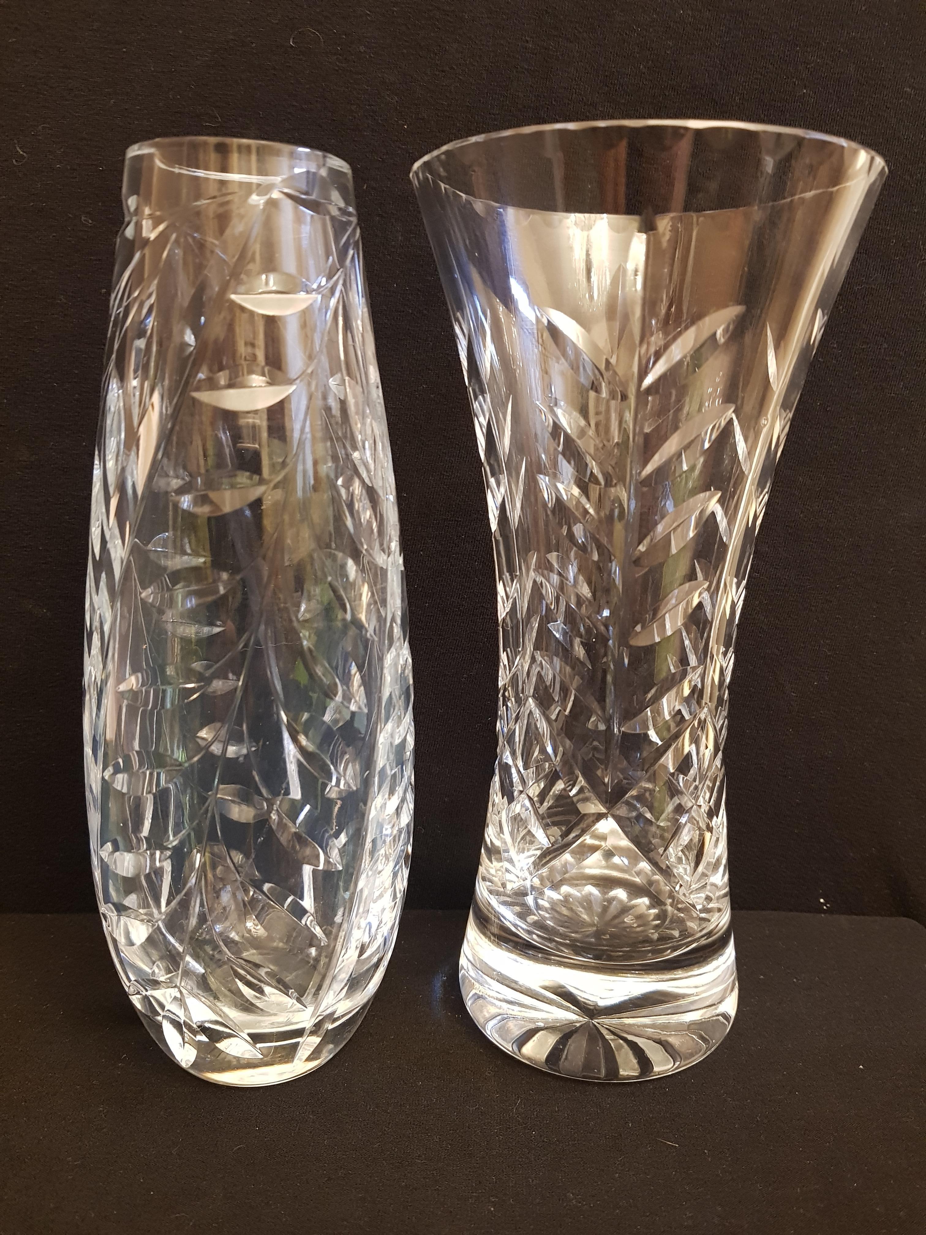 Beautiful vitange set of two hand cut crystal ases made in italy perfect condition beautiful home decor.