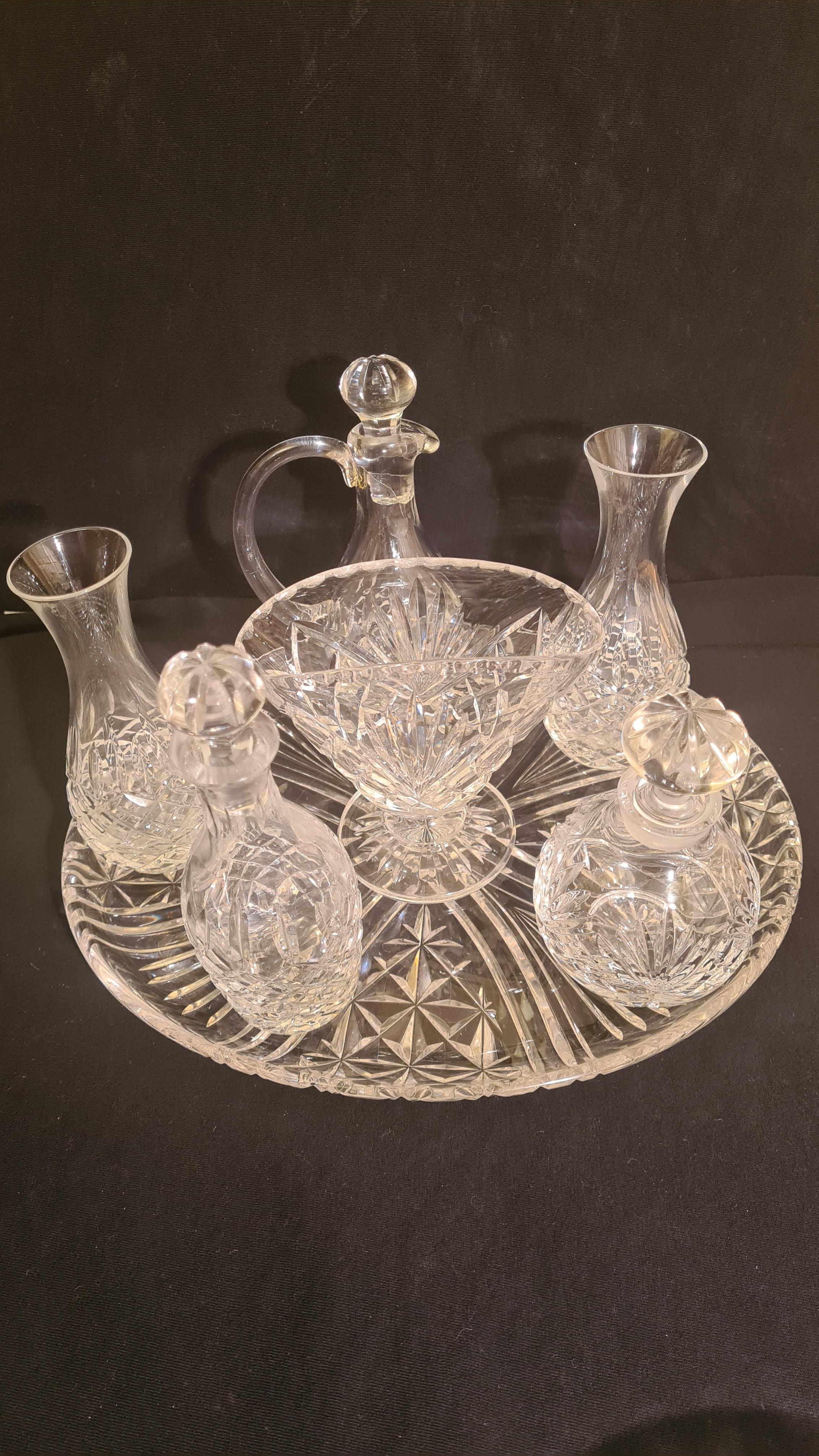 Beautiful vintage Stuart crystal table set, 9 pieces,Stuart acid stamp, 1 plate 27 cm width, two bowls to 17 cm and 10 cm width, two vases 14 cm tall, two decanters for (oil and vinegar) 15 cm tall, one perfume bottle 12 cm tall and napkin holder 12