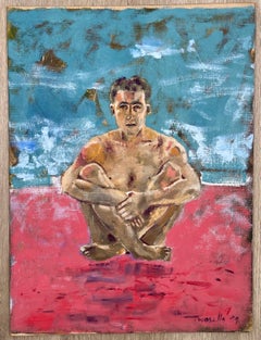 Uomo nudo sulla spiaggia