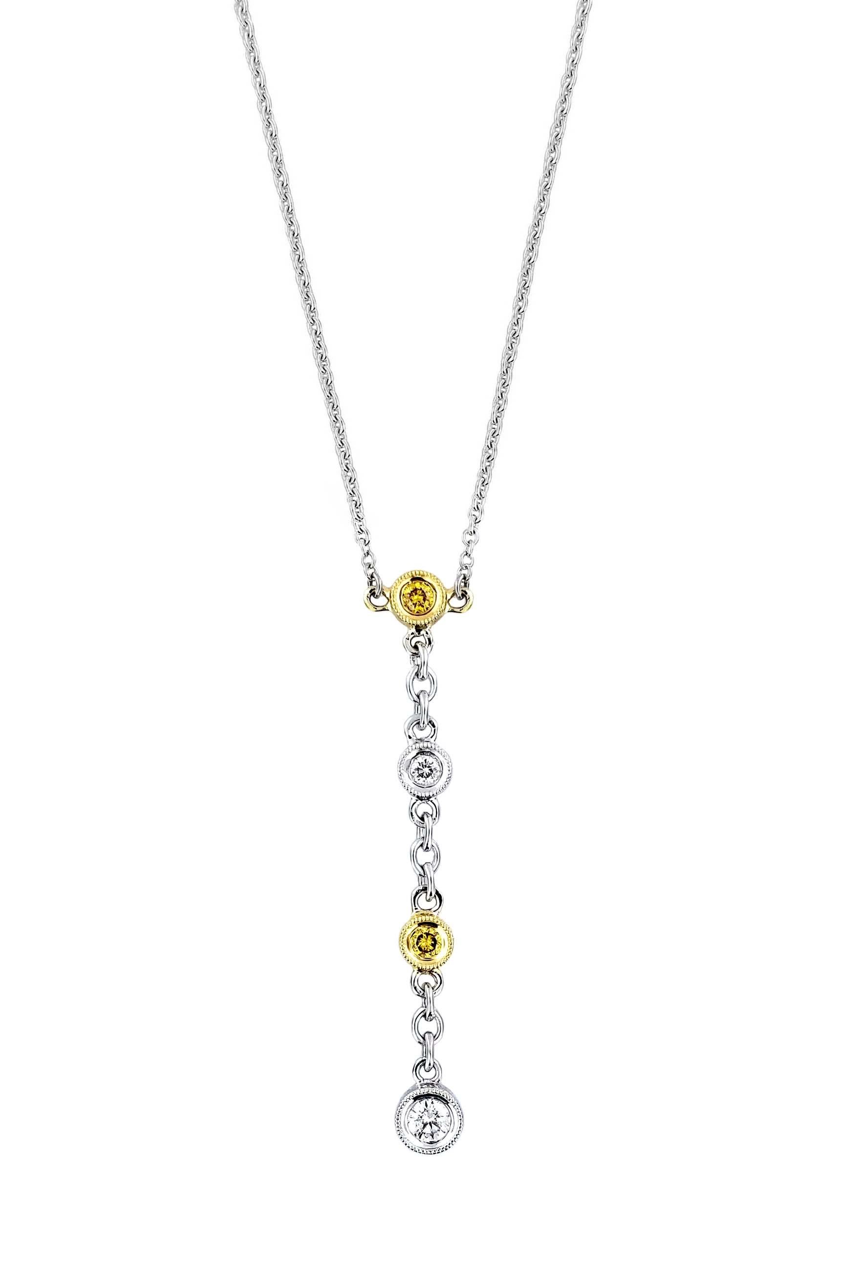 Produced by award winning Italian designer Stefano Vitolo. Stefano creates custom artisanal one of a kind jewelry with excellent gemstones in a truly old world Italian craftmanship.

0.08 carat white diamonds
0.05 carat yellow diamonds