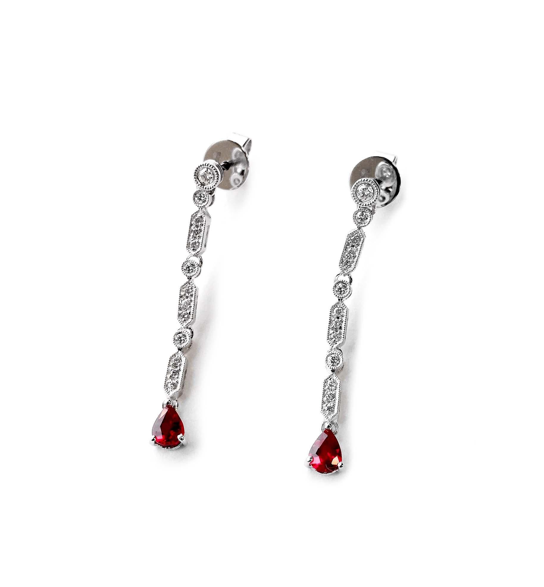Produced by award winning Italian designer Stefano Vitolo. Stefano creates custom artisanal one of a kind jewelry with excellent gemstones in a truly old world Italian craftmanship.

Gemstones: 0.60ct Rubies, 0.30ct Diamonds
