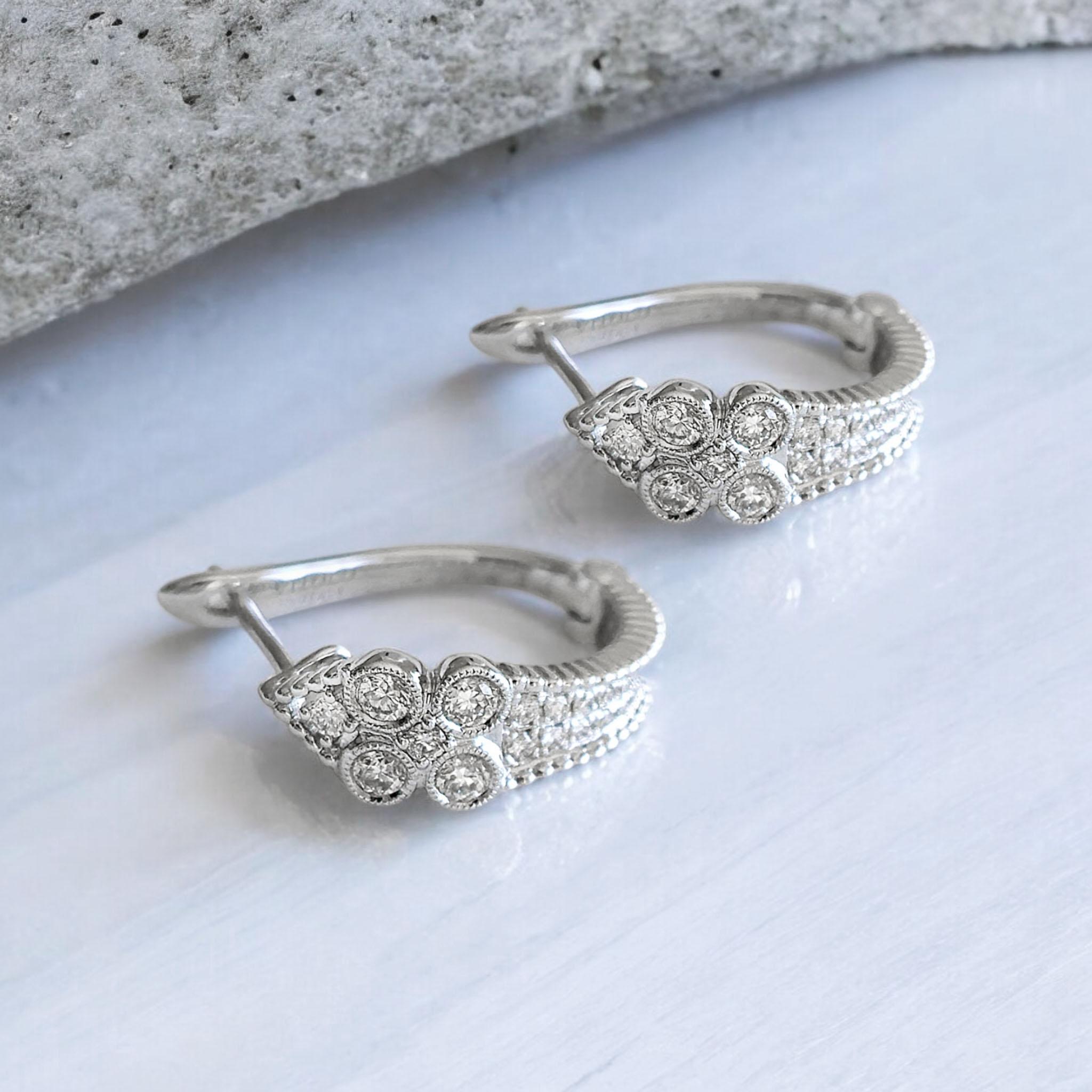 Produced by award winning Italian designer Stefano Vitolo. Stefano creates custom artisanal one of a kind jewelry with excellent gemstones in a truly old world Italian craftmanship.

This diamond earrings have 0.59 total carat weight of F/G color