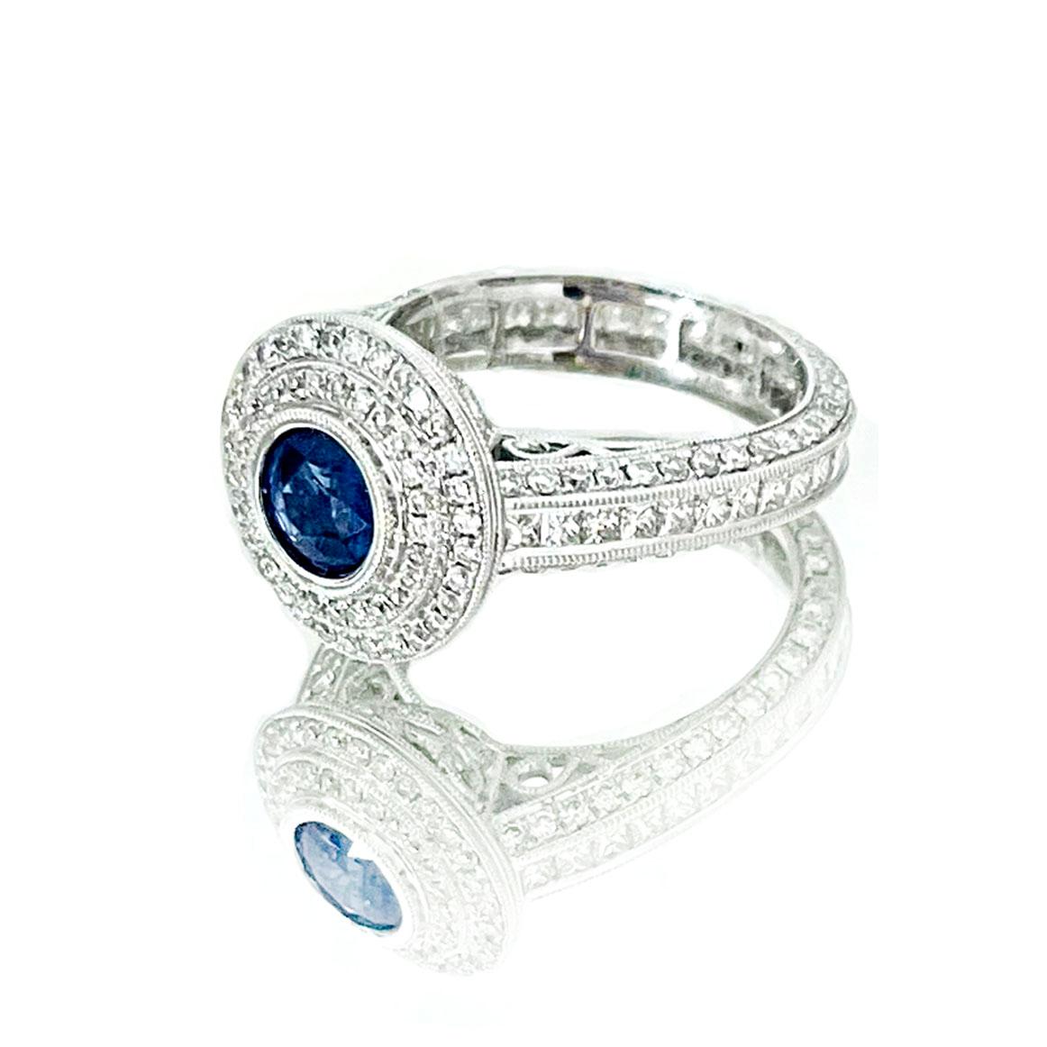 Produced by award winning Italian designer Stefano Vitolo. Stefano creates custom artisanal one of a kind jewelry with excellent gemstones in a truly old world Italian craftmanship.

Gemstones: Diamonds 2.12 ctw, Blue Sapphire 0.90 ctw
Ring width: