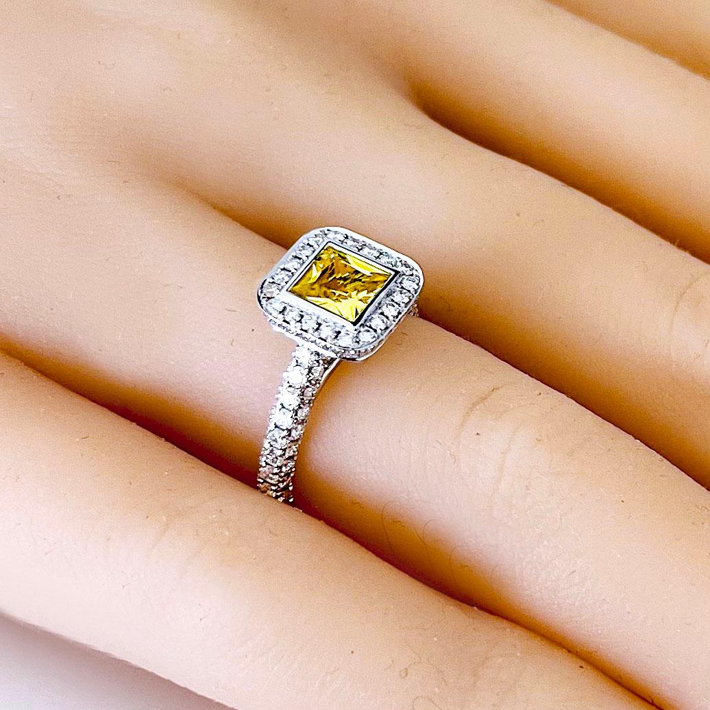 Produced by award winning Italian designer Stefano Vitolo. Stefano creates custom artisanal one of a kind jewelry with excellent gemstones in a truly old world Italian craftmanship.
This handcrafted ring has 1.15 carat yellow sapphire and 1.52 carat