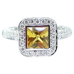18 Karat Gold Diamond Ring with Yellow Sapphire
