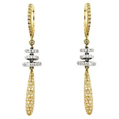 Boucles d'oreilles pendantes en or 18 carats avec diamants en forme de rondelles