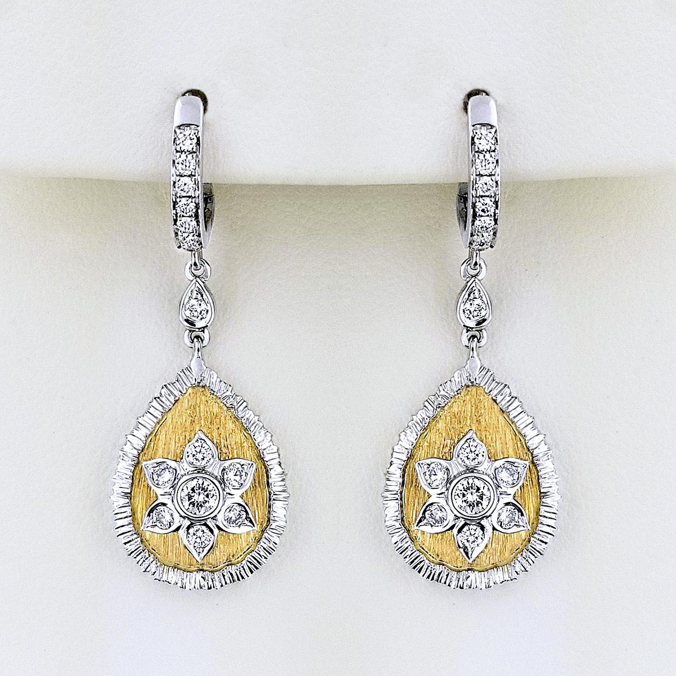 Produced by award winning Italian designer Stefano Vitolo. Stefano creates custom artisanal one of a kind jewelry with excellent gemstones in a truly old world Italian craftmanship.
These handcrafted earring have 0.45 total carat weight of F/G