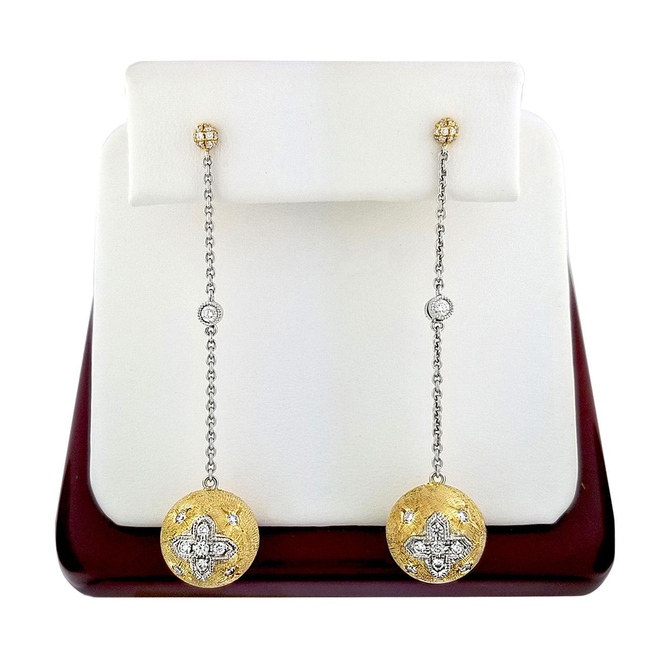Produced by award winning Italian designer Stefano Vitolo. Stefano creates custom artisanal one of a kind jewelry with excellent gemstones in a truly old world Italian craftmanship.
These handcrafted earrings have 0.51 total carat weight of F/G