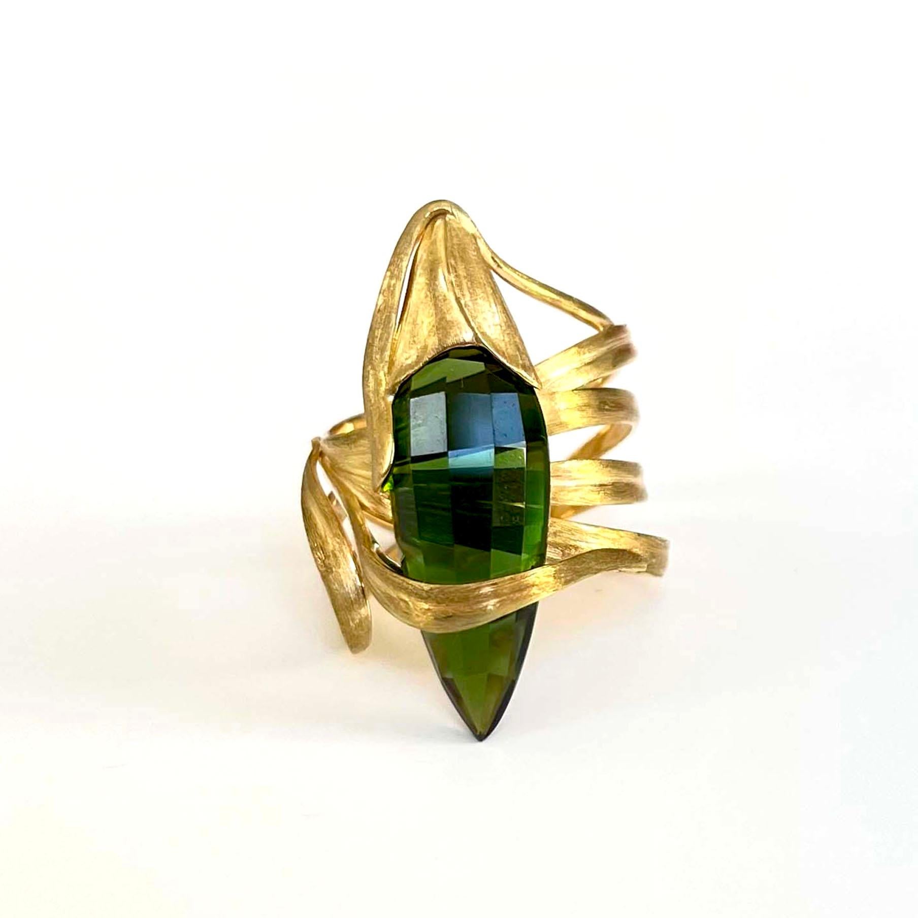Produced by award winning Italian designer Stefano Vitolo. Stefano creates custom artisanal one of a kind jewelry with excellent gemstones in a truly old world Italian craftmanship. This handcrafted ring has 9.89 carat Green Tourmaline.
