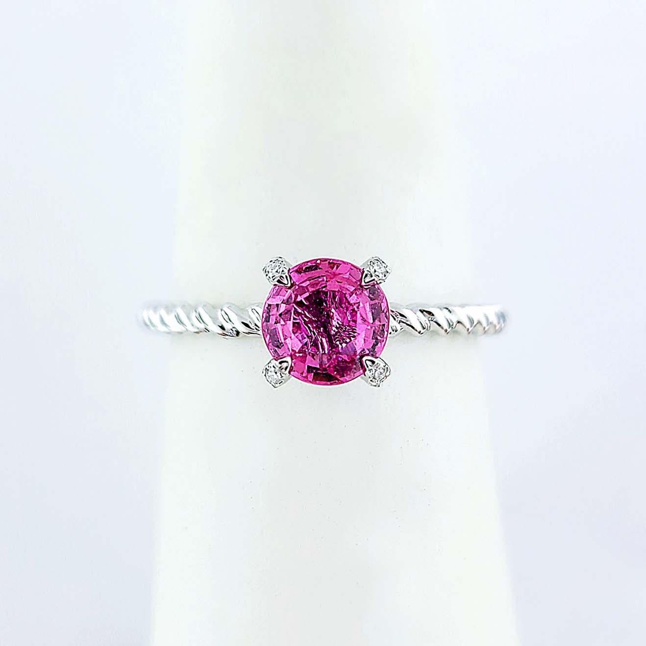 Produced by award winning Italian designer Stefano Vitolo. Stefano creates custom artisanal one of a kind jewelry with excellent gemstones in a truly old world Italian craftmanship.
This handcrafted ring has 0.94 carat pink sapphire and melee