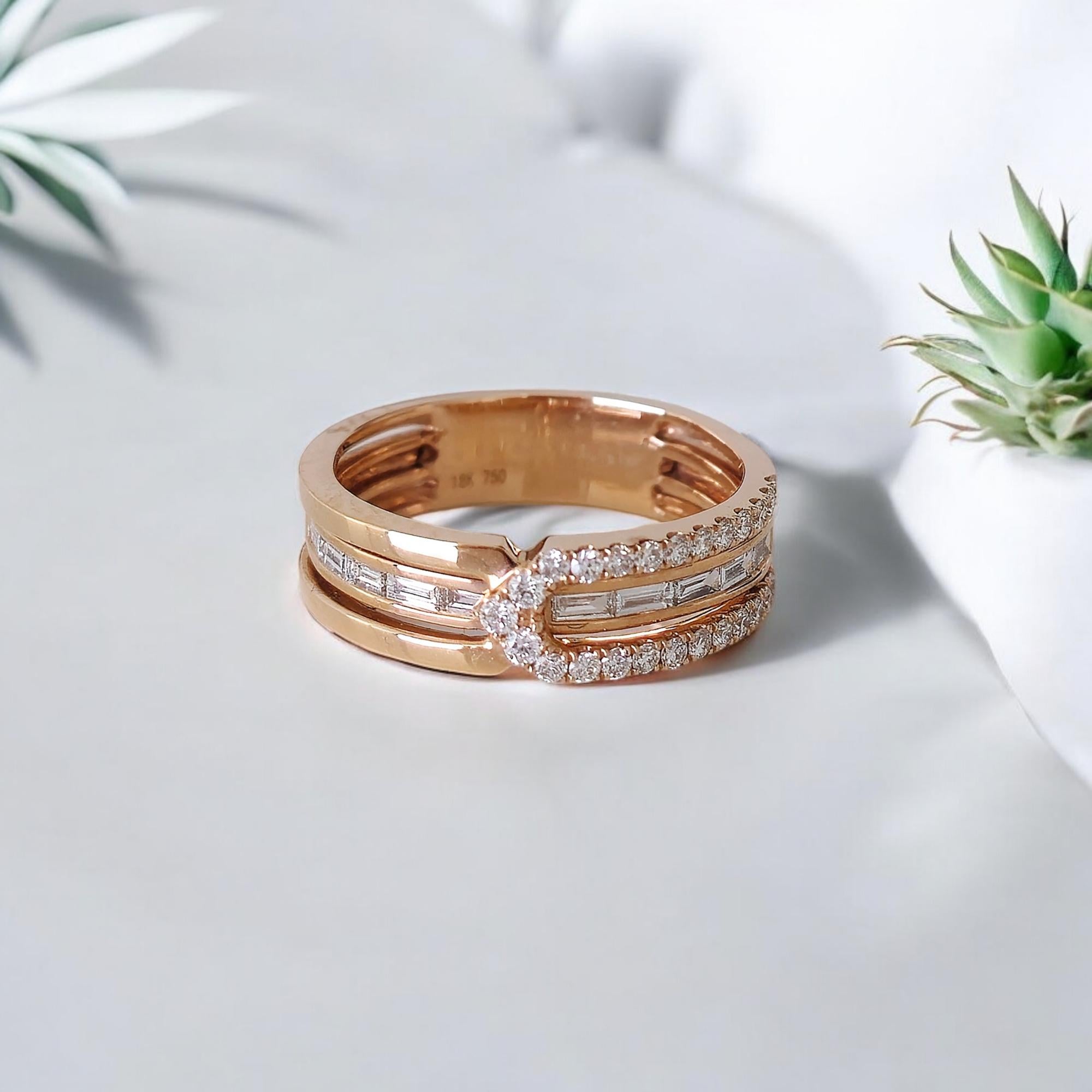 Produced by award winning Italian designer Stefano Vitolo. Stefano creates custom artisanal one of a kind jewelry with excellent gemstones in a truly old world Italian craftmanship.

Baguette diamonds: 0.24ct
Round diamonds: 0.28ct
Ring width: 4 mm
