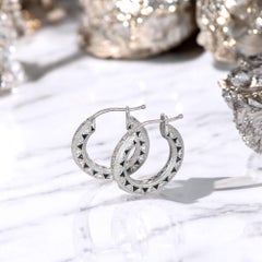 Vitolo, créoles en or blanc 18 carats et diamants.