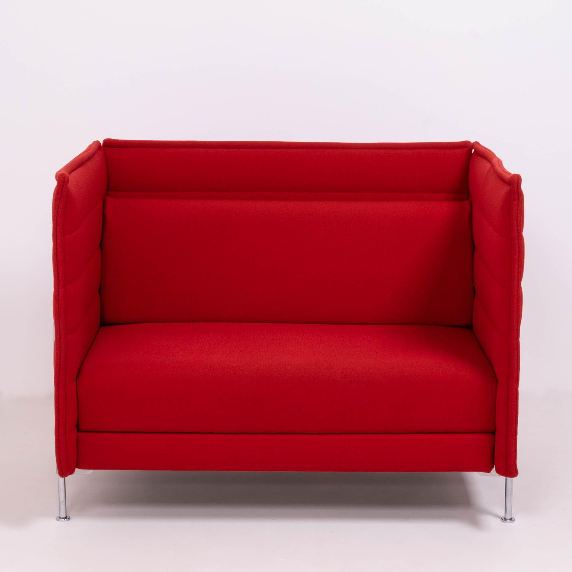 Designed by Ronan & Erwan Bouroullec in 2006, the Vitra Alcove loveseat sofa is an architectural piece of furniture, allowing for small spaces to be created.

Constructed with a tubular steel frame, this sofa is upholstered in vibrant red fabric,