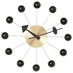 Vitra Ball Clock in Black and Brass by George Nelson