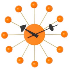 Vitra Ball Clock in Orange by George Nelson