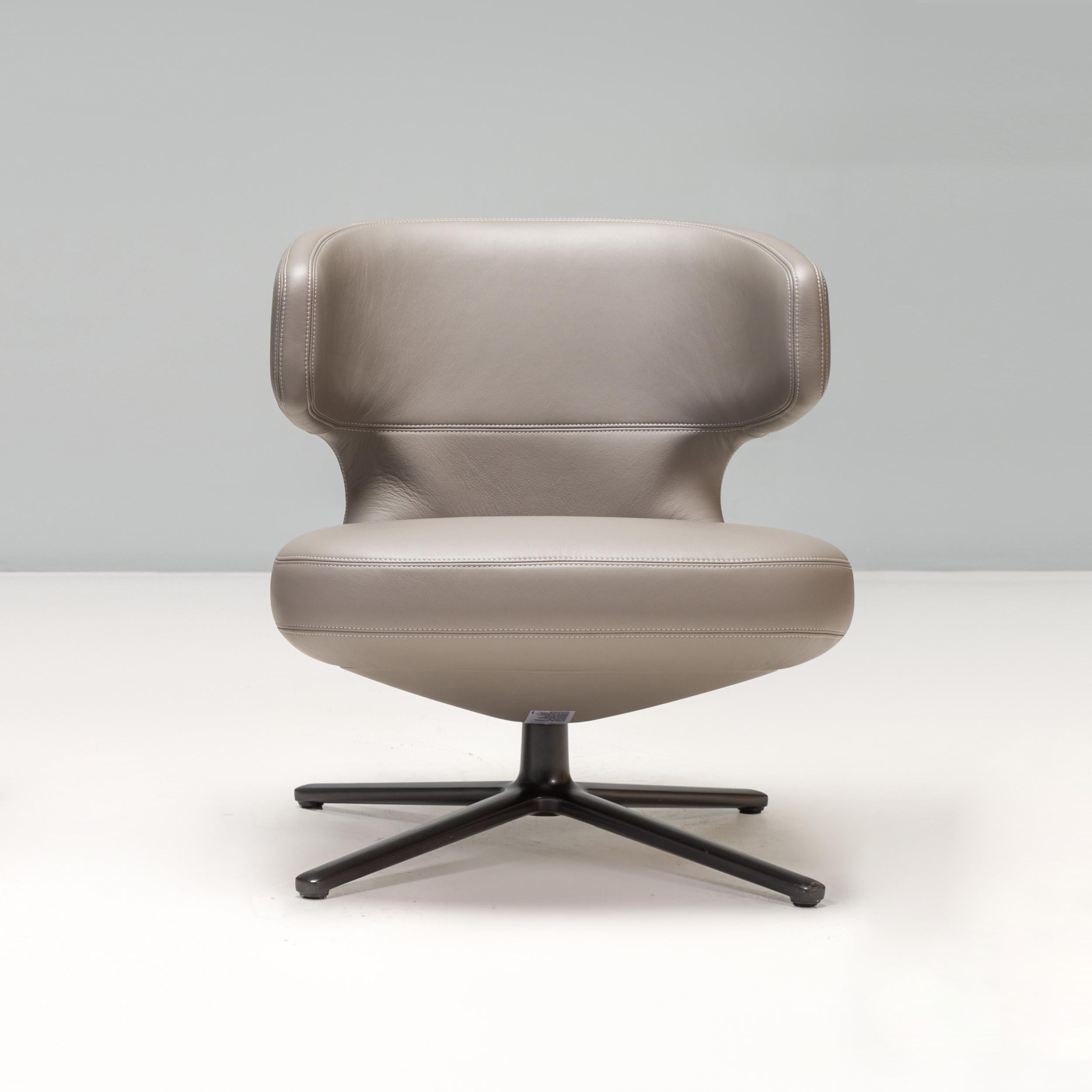 Designed by Antonio Citterio, the Petit Repos chair was introduced to the Vitra collection in 2013.

The chair offers the same ultimate comfort of the larger Repos styles, but in a more compact shape. 

Upholstered in grey leather, the armchair