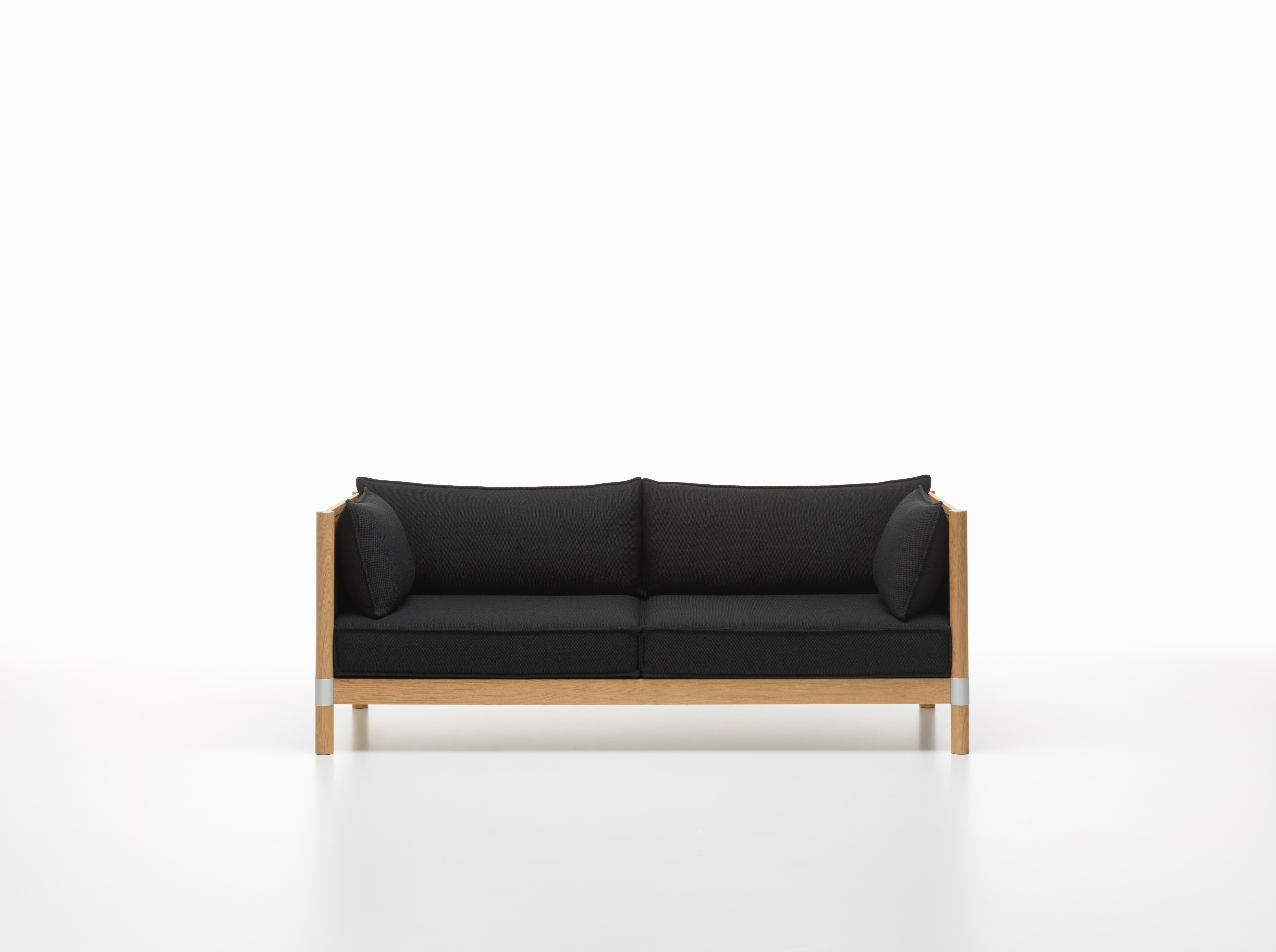 These products are only available in the United States.

The clean-lined aesthetic of Cyl sofa, with its smooth planes, orthogonal frame and cylindrical supports, is emphasized by components made of solid wood. This makes it an ideal piece for