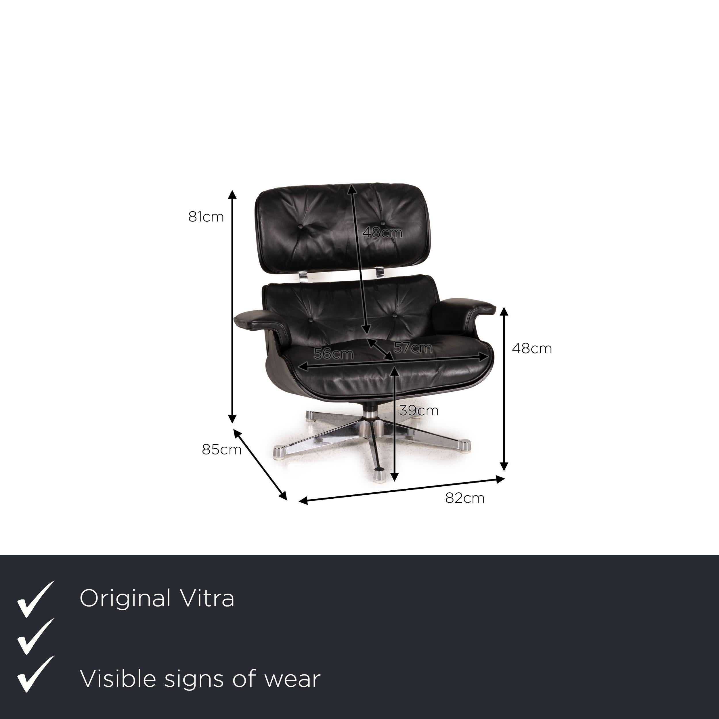 We present to you a Vitra Eameas lounge leather armchair black including ottoman.
 SKU: #16349-c1
 

 Product measurements in centimeters:
 

 depth: 85
 width: 82
 height: 81
 seat height: 39
 rest height: 48
 seat depth: 57
 seat
