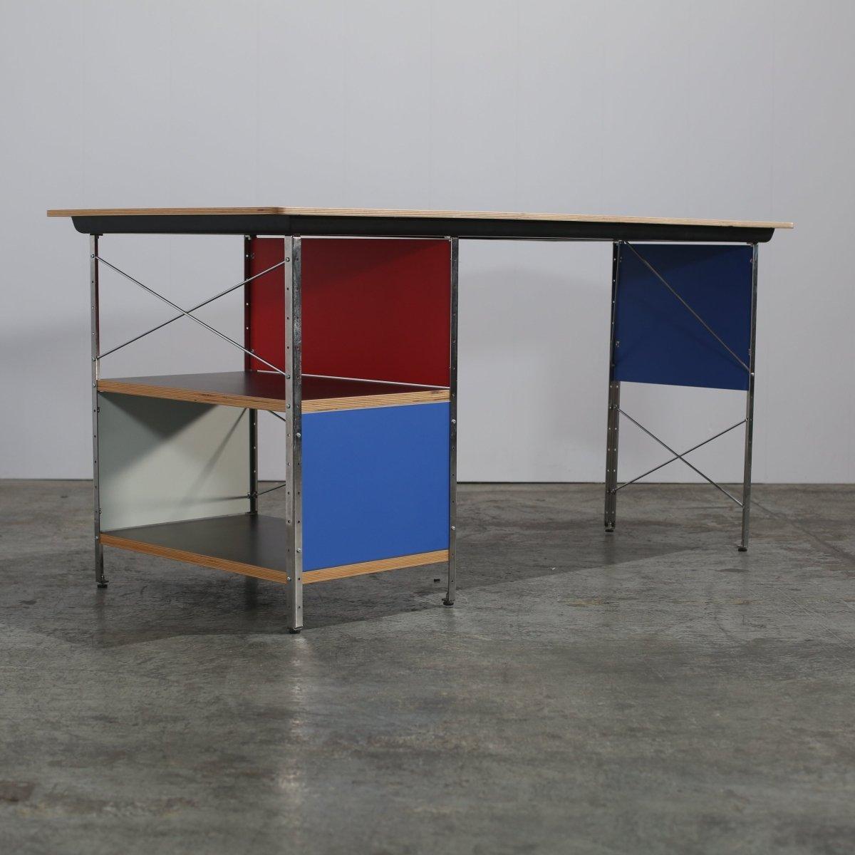 Enhance your workspace with the iconic Eames EDU Desk Unit by Vitra, designed by the legendary Charles and Ray Eames. This timeless piece combines form and function, featuring a sleek laminate top and a robust metal frame that ensures durability and