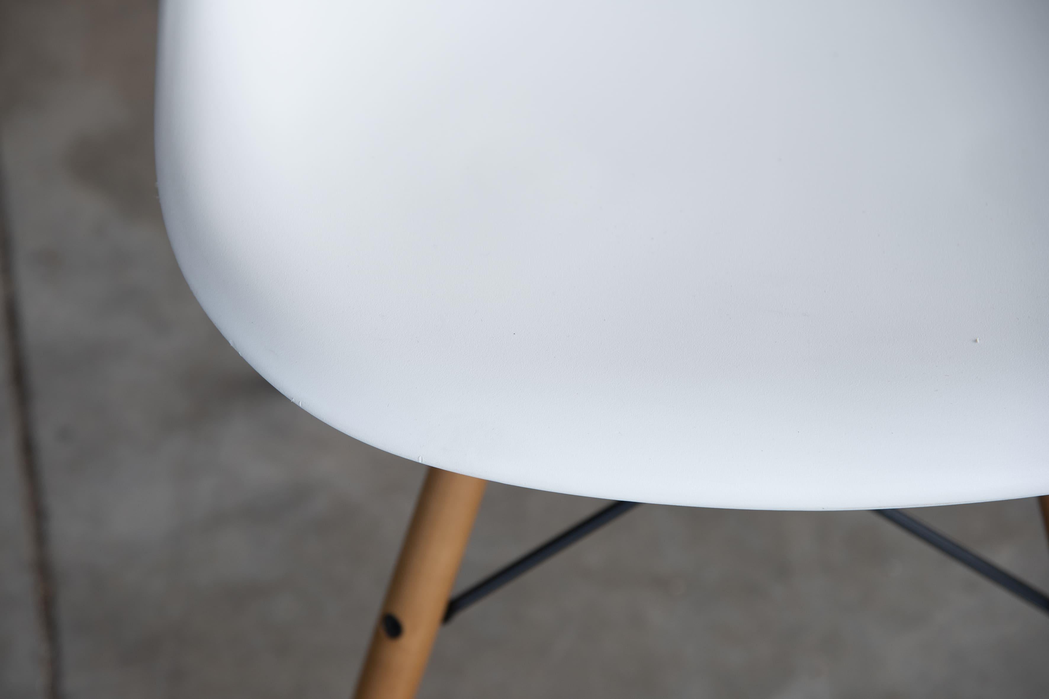 Vitra Eames White Plastic and light Wood Side Chairs DSW 10