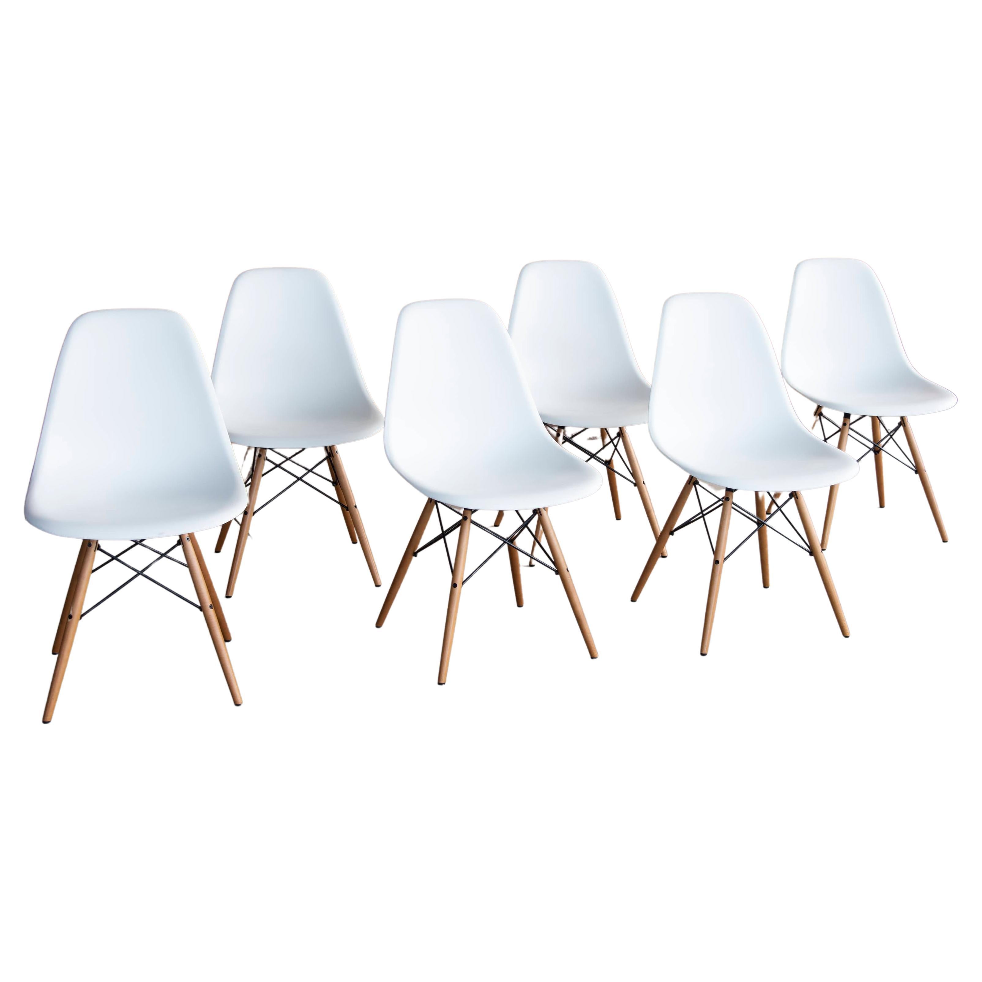 Vitra Eames White Plastic and light Wood Side Chairs DSW