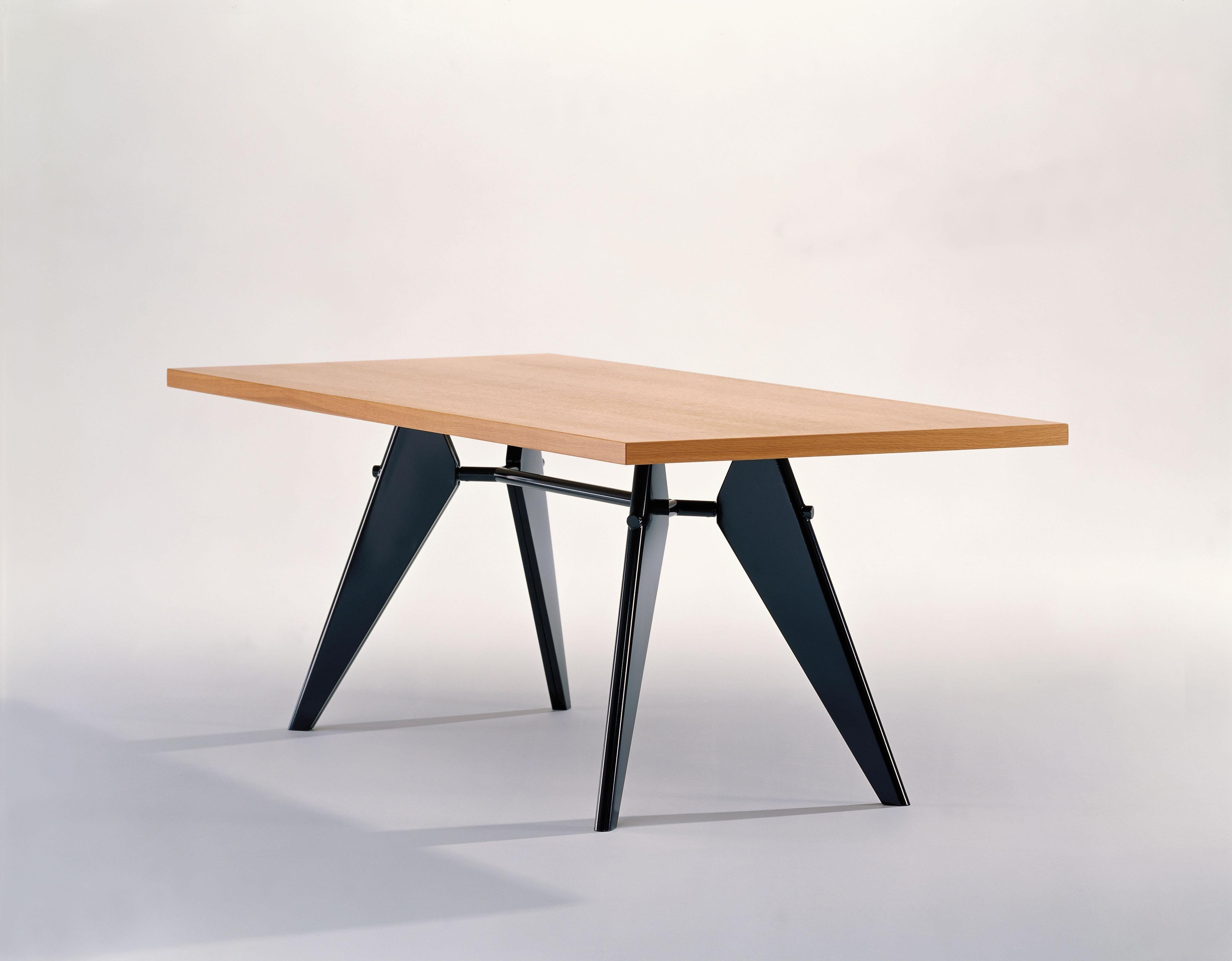 These items are currently only available in the United States.

The aesthetic appearance of Jean Prouvé's EM Table adheres to structural principles, illustrating the flow of forces and stresses in its construction. It comes in a range of sizes with