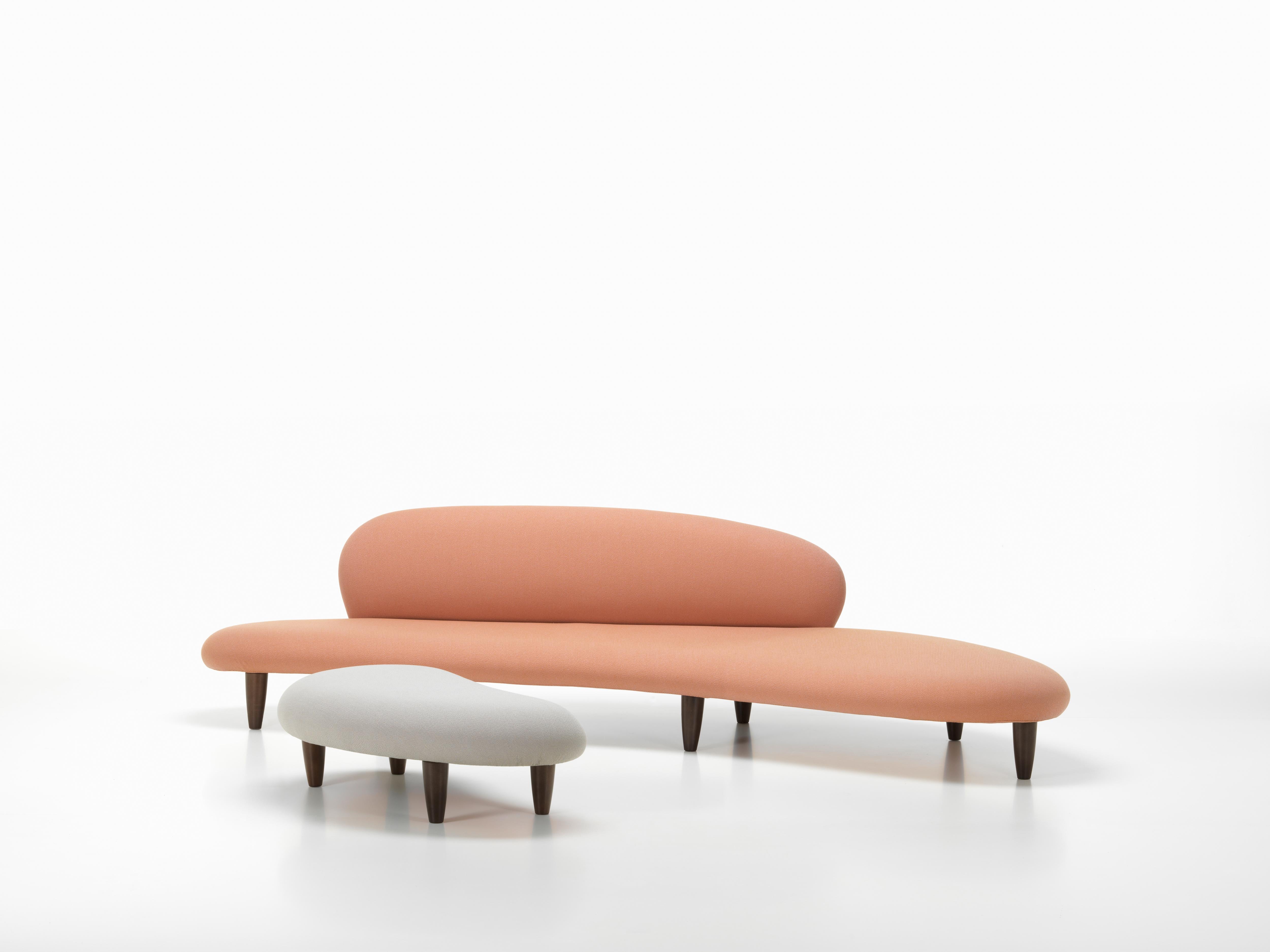 These items are only available in the United States.

Ottoman like an enlarged sculpture of flat, rounded river stones. The slender organic forms are fluid and graceful. Noguchi emphasizes the lightness of the elements with thin yet comfortable