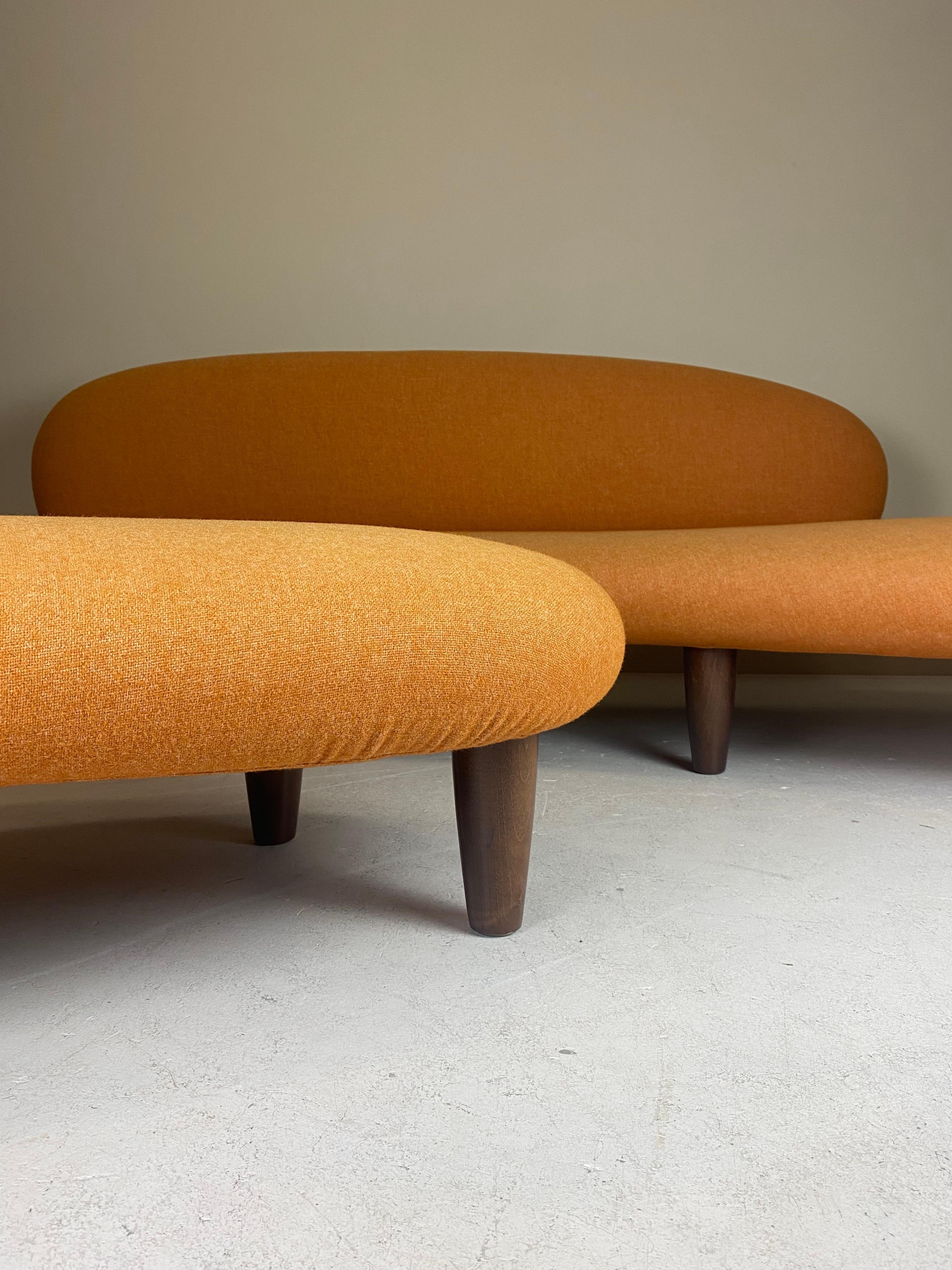 Designed in 1946 and completely different from other designs of the same period, the Freeform Sofa embodies the poetic quality in Isamu Noguchi’s designs. Brochures and magazines talk about the sculptural quality of Sofa and Ottoman, which seems to