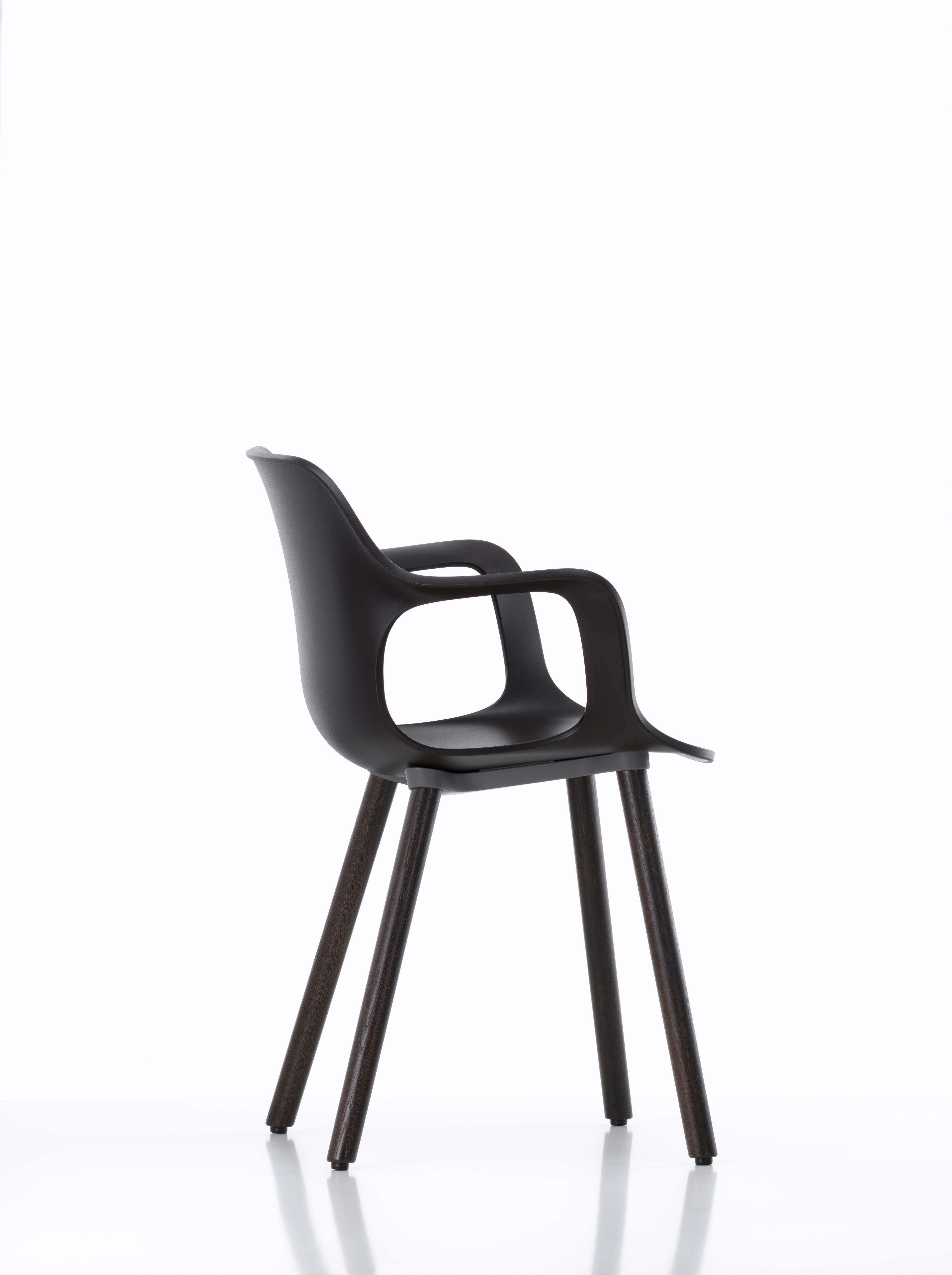 These products are only available in the United States.

Vitra HAL Armchair Wood in Chocolate by Jasper Morrison.

Materials:
Seat shell: Dyed-through polypropylene.
Base: Non-stackable wooden base in dark oak Connecting element between shell and