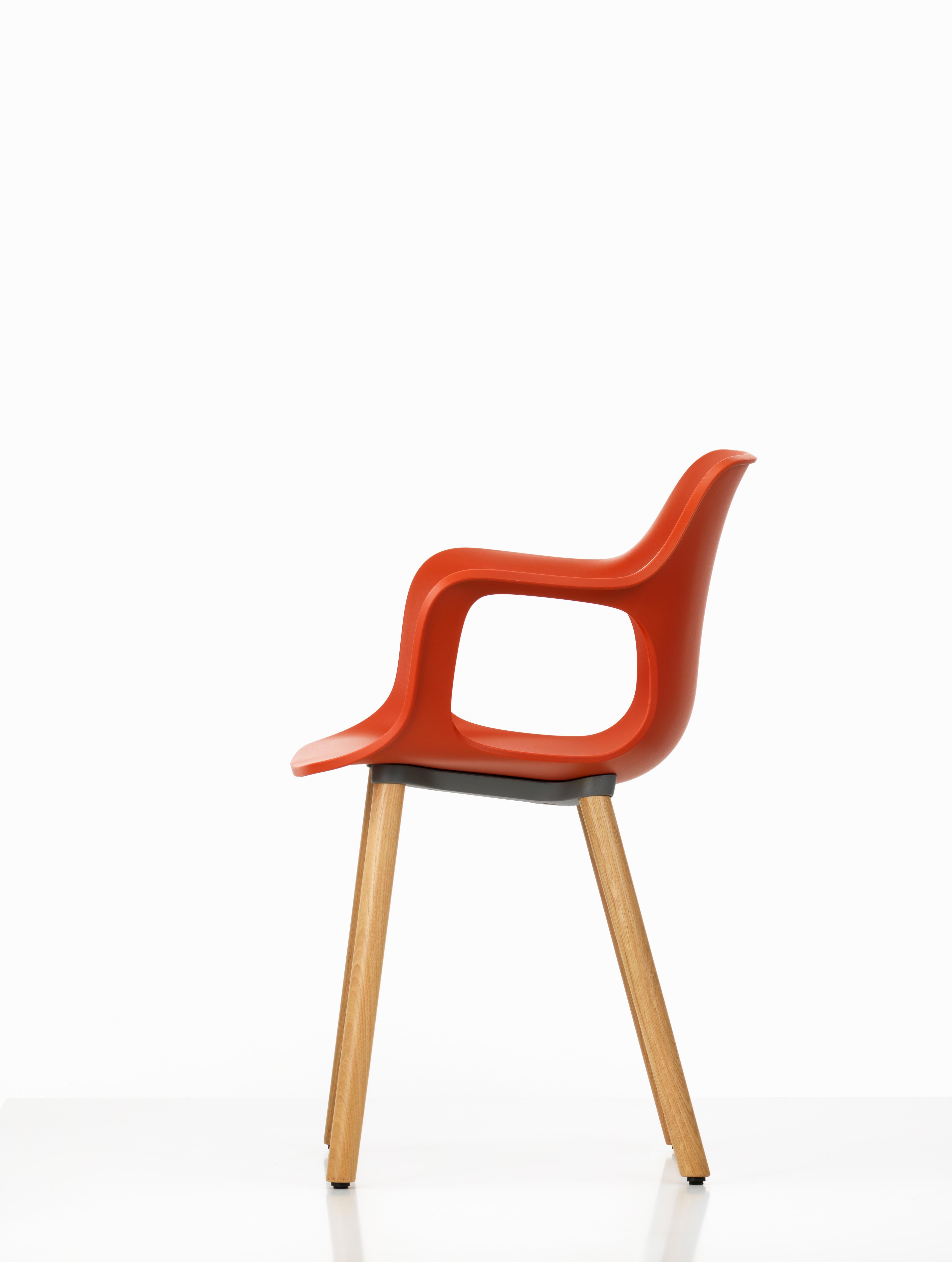 These products are only available in the United States.

Vitra HAL armchair wood in orange by Jasper Morrison.

Materials:
Seat shell: Dyed-through polypropylene.
Base: Non-stackable wooden base in natural oak Connecting element between shell and