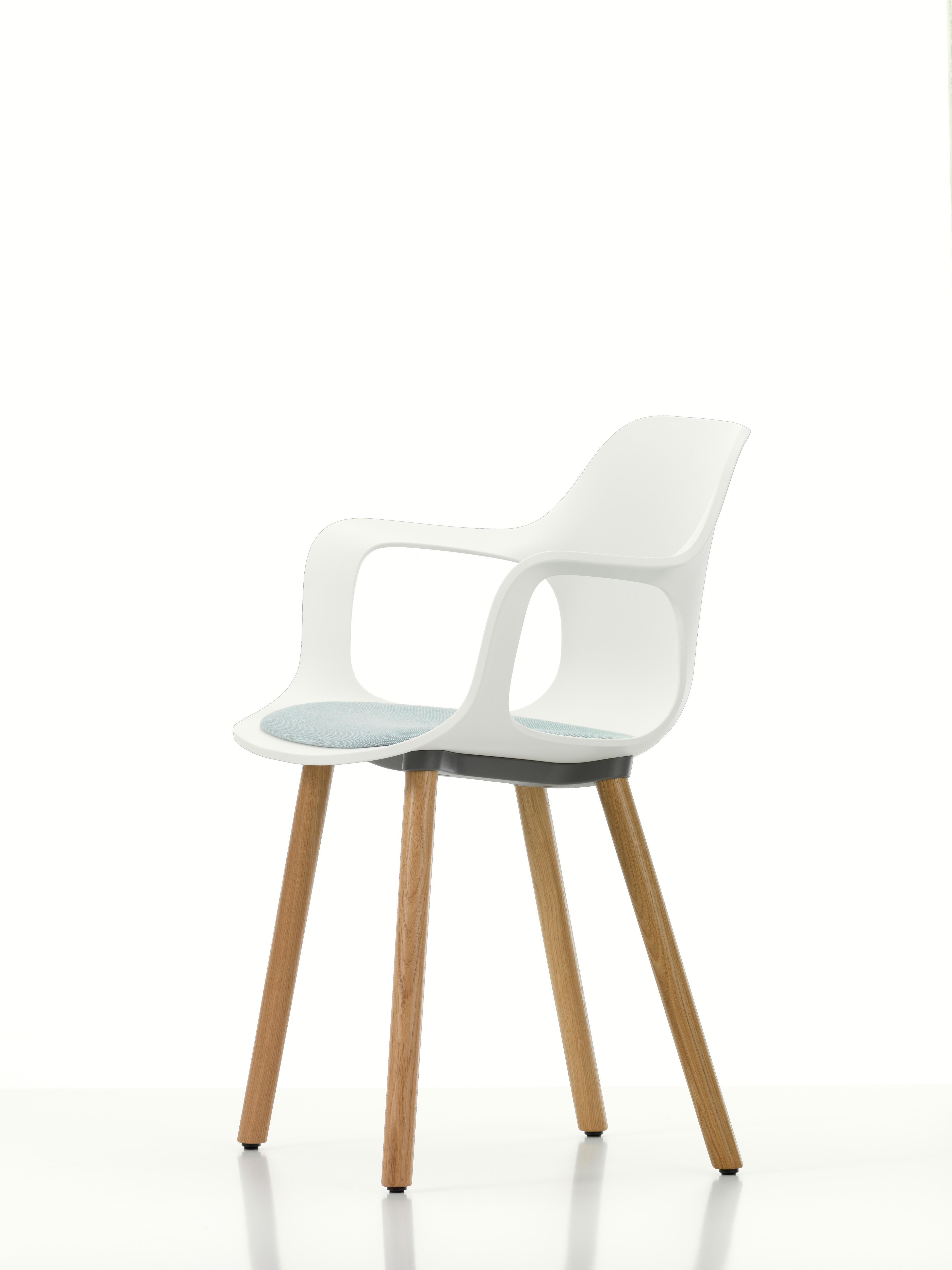 These products are only available in the United States.

Vitra HAL armchair wood with seat upholstery in white by Jasper Morrison.

Materials:
Seat shell: Dyed-through polypropylene, with seat cushion (screwed to the seat shell).
Base: Non-stackable