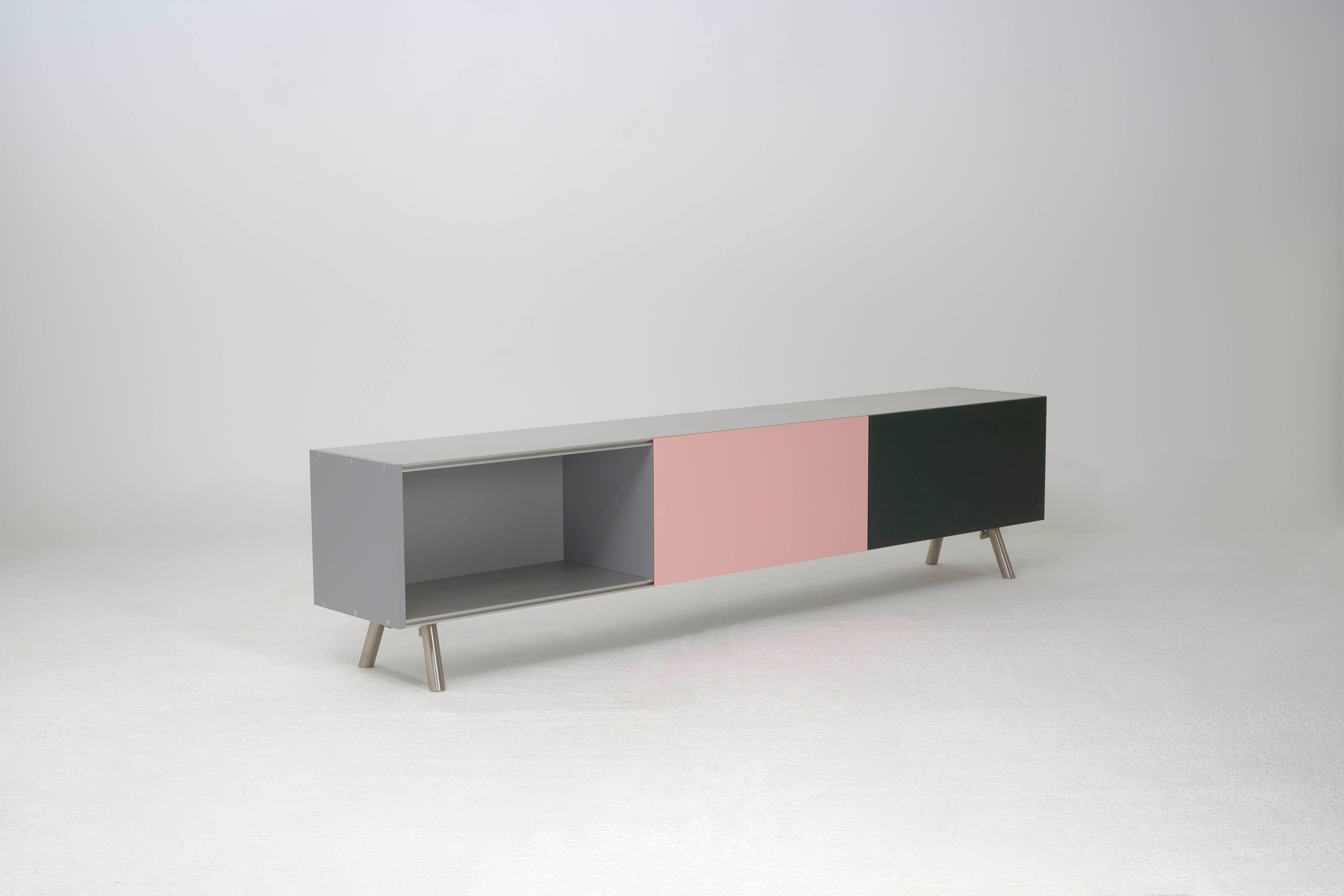 The Kast storage unit is a sideboard by Maarten Van Severen.

Belgian-born Maarten van Severen, who worked with architect Rem Koolhaas and designed pieces for Vitra, Edra, Kartell, and Alessi, was one of the most acclaimed designers of his