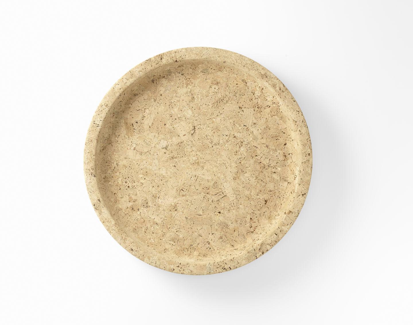 Turned from pure cork, the Cork Bowls have a characteristic surface pattern and are velvety to the touch. They are available in two sizes and can be used as a shallow bowl or tray. Cork is a renewable raw material that is consistent with Vitra‘s