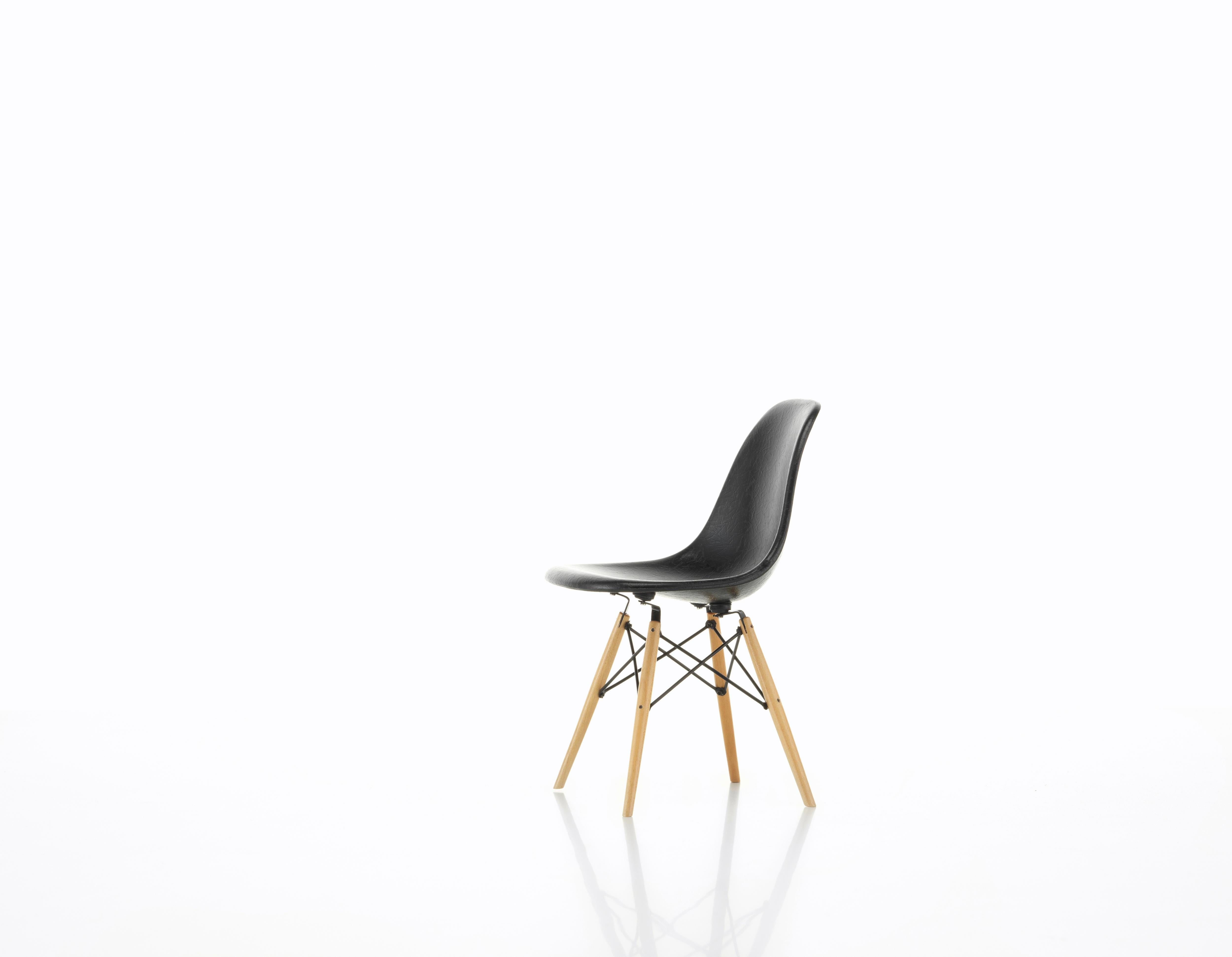 These items are currently only available in the United States.

The fiberglass chairs are rare examples of a satisfying synthesis of formal and technical innovation. For the first time in the history of design, Charles & Ray Eames utilized