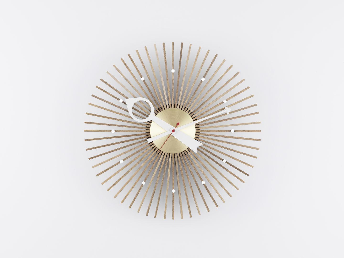 In 1947, the American designer George Nelson was commissioned to create a collection of clocks. Nelson analyzed how people used clocks and concluded that they read the time by discerning the relative position of the hands, which made the use of