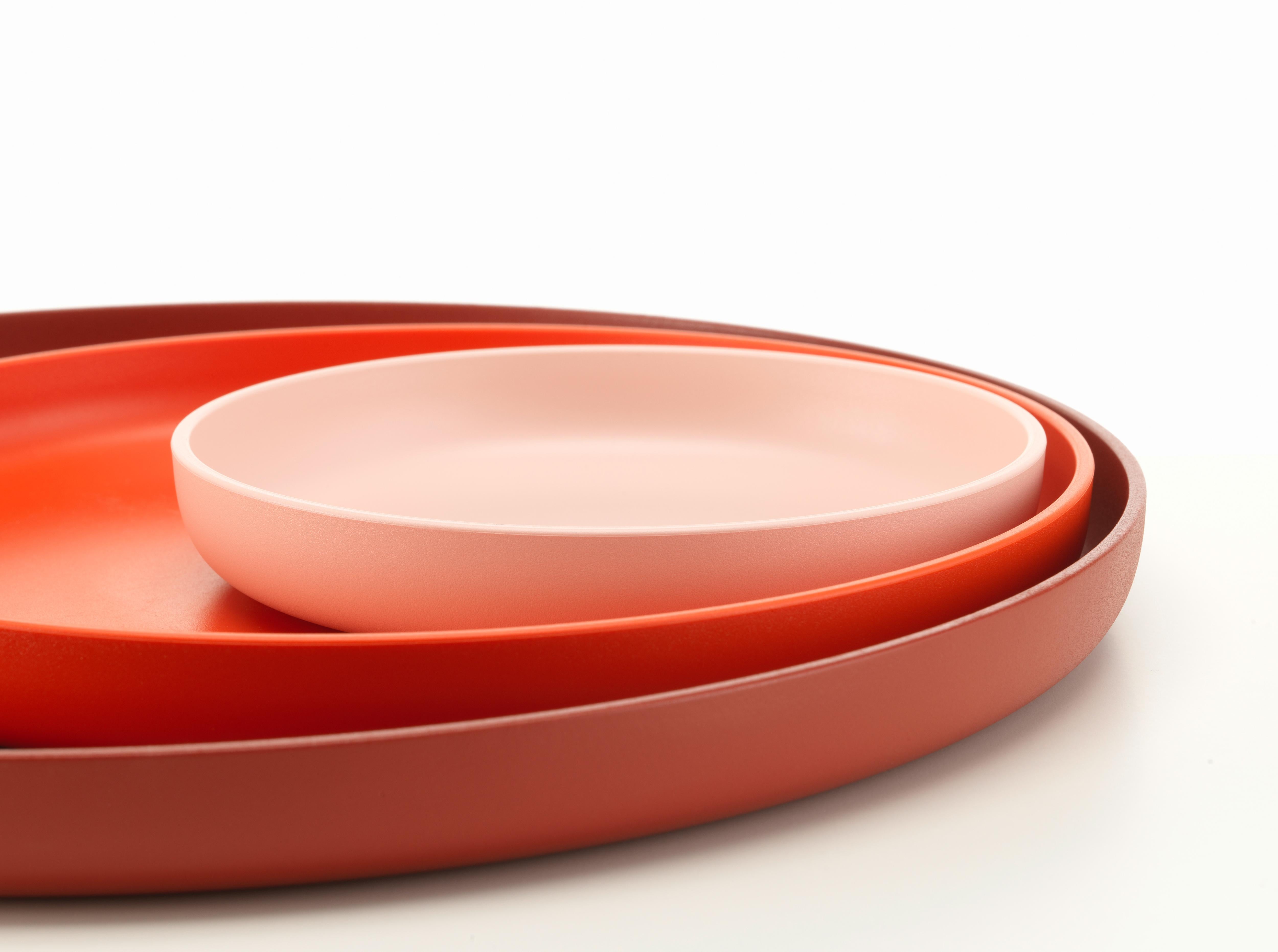 These products are only available in the United States.

At first glance, the Trays appear to be simple, flat dishes made of plastic. They were, however, developed by Jasper Morrison as a set of three, in carefully harmonized colors and sizes, in