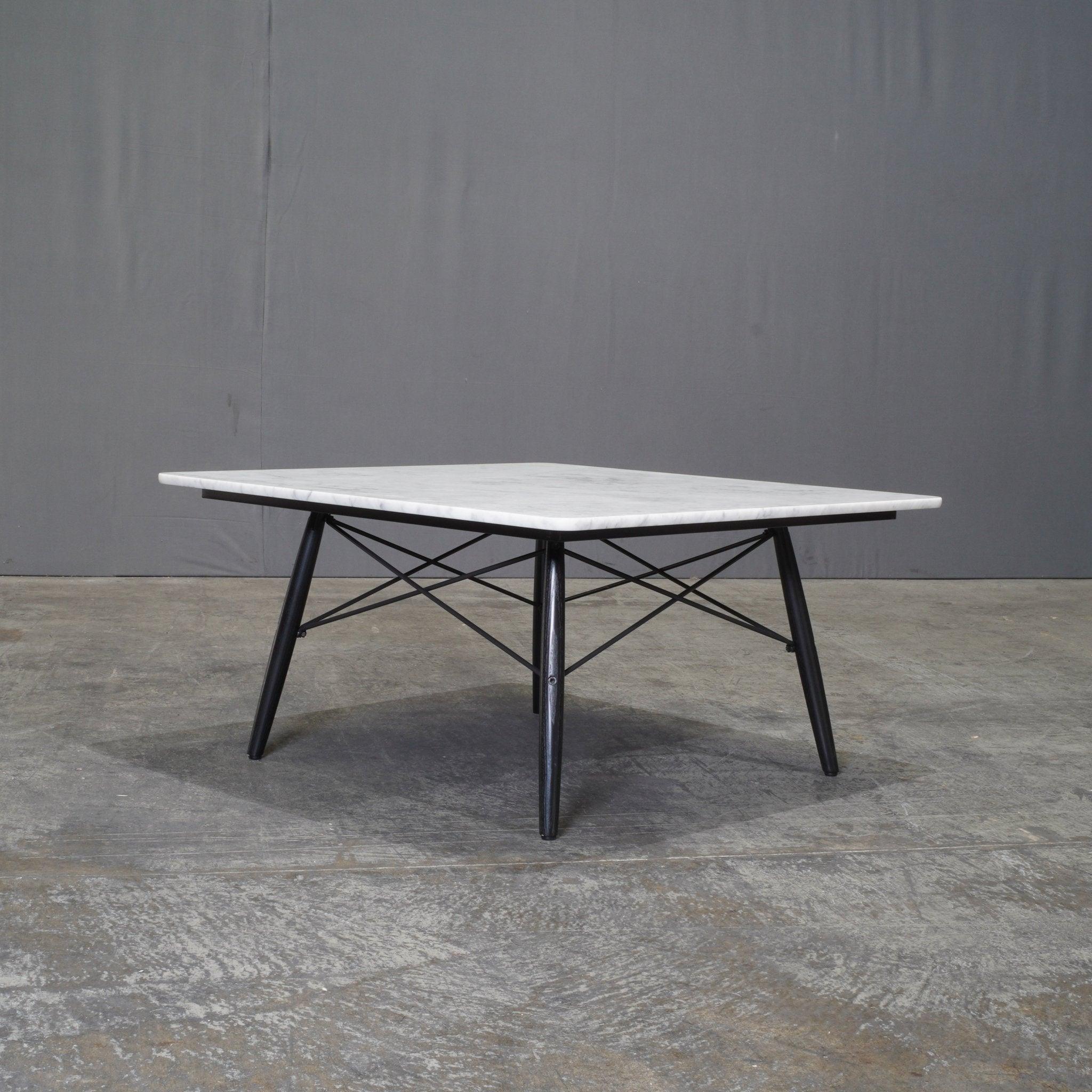Designed in 1949, the Vitra Square Coffee Table by Charles and Ray Eames is a quintessential piece that reflects the timeless design ethos of the iconic duo. This table showcases a perfect balance between form and function, with a sleek square