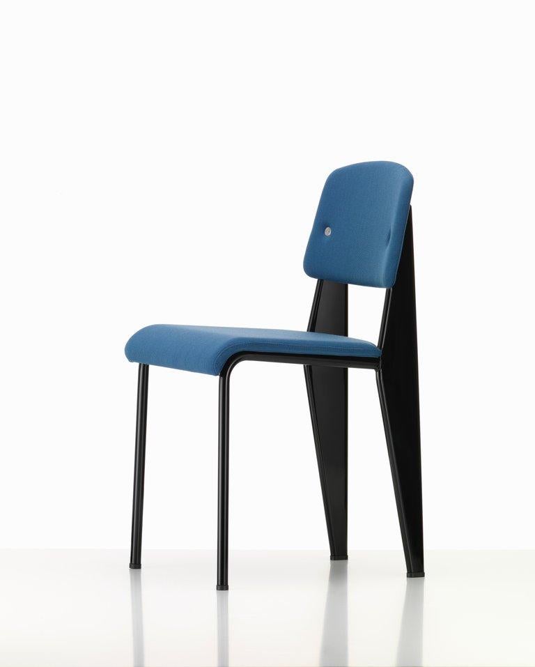 Vitra standard SR chair in Indigo and deep black by Jean Prouvé. The engineer and designer Jean Prouvé produced his creations in his own workshop in Nancy. This enabled him to easily implement customer requests and changes to the products. Numerous