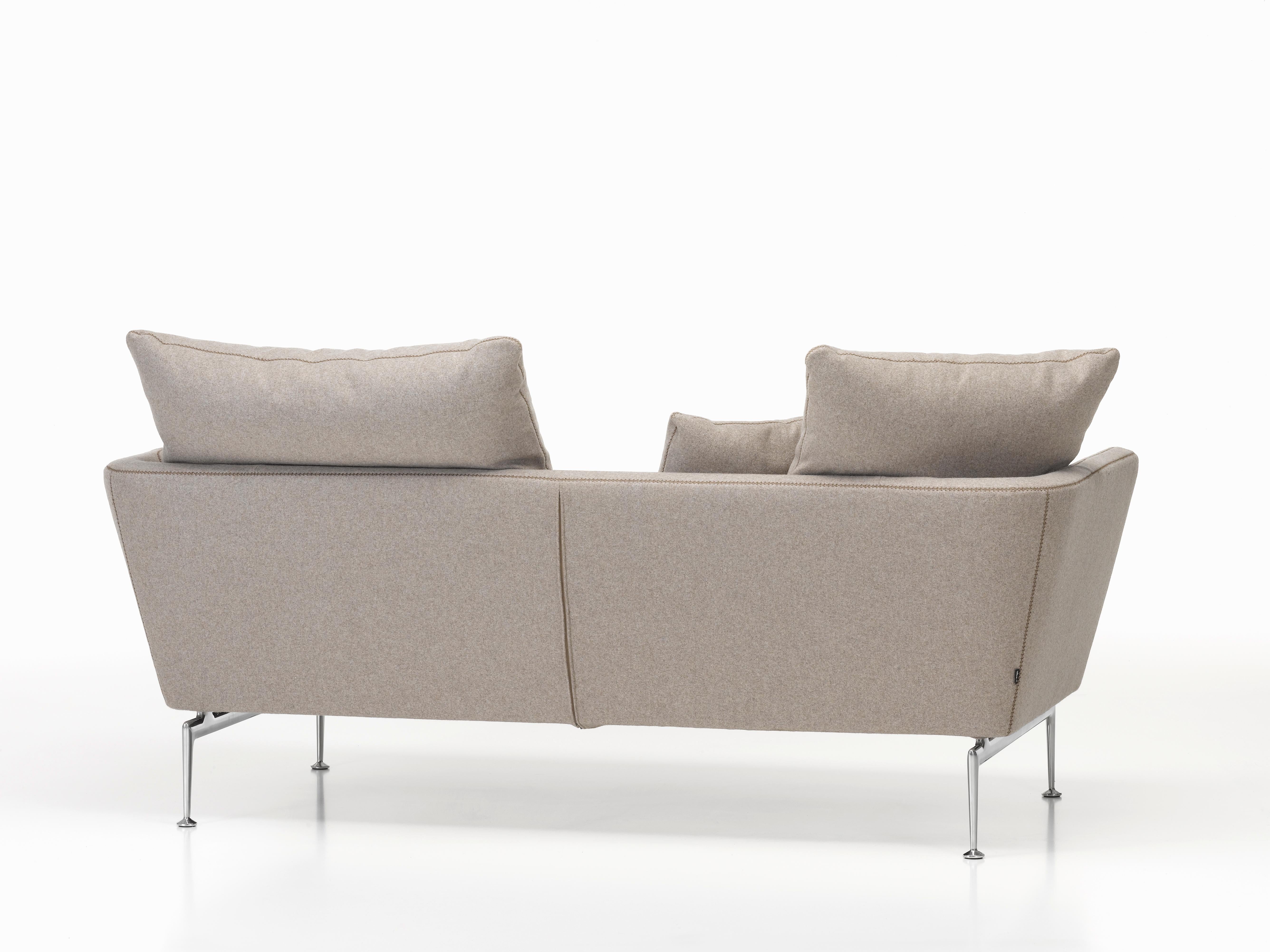 These items are currently only available in the United States.

The Suita sofa system combines light and slender volumes with an Industrial and technological aesthetic. The geometrically precise body and cushions seem to float above the sleek,