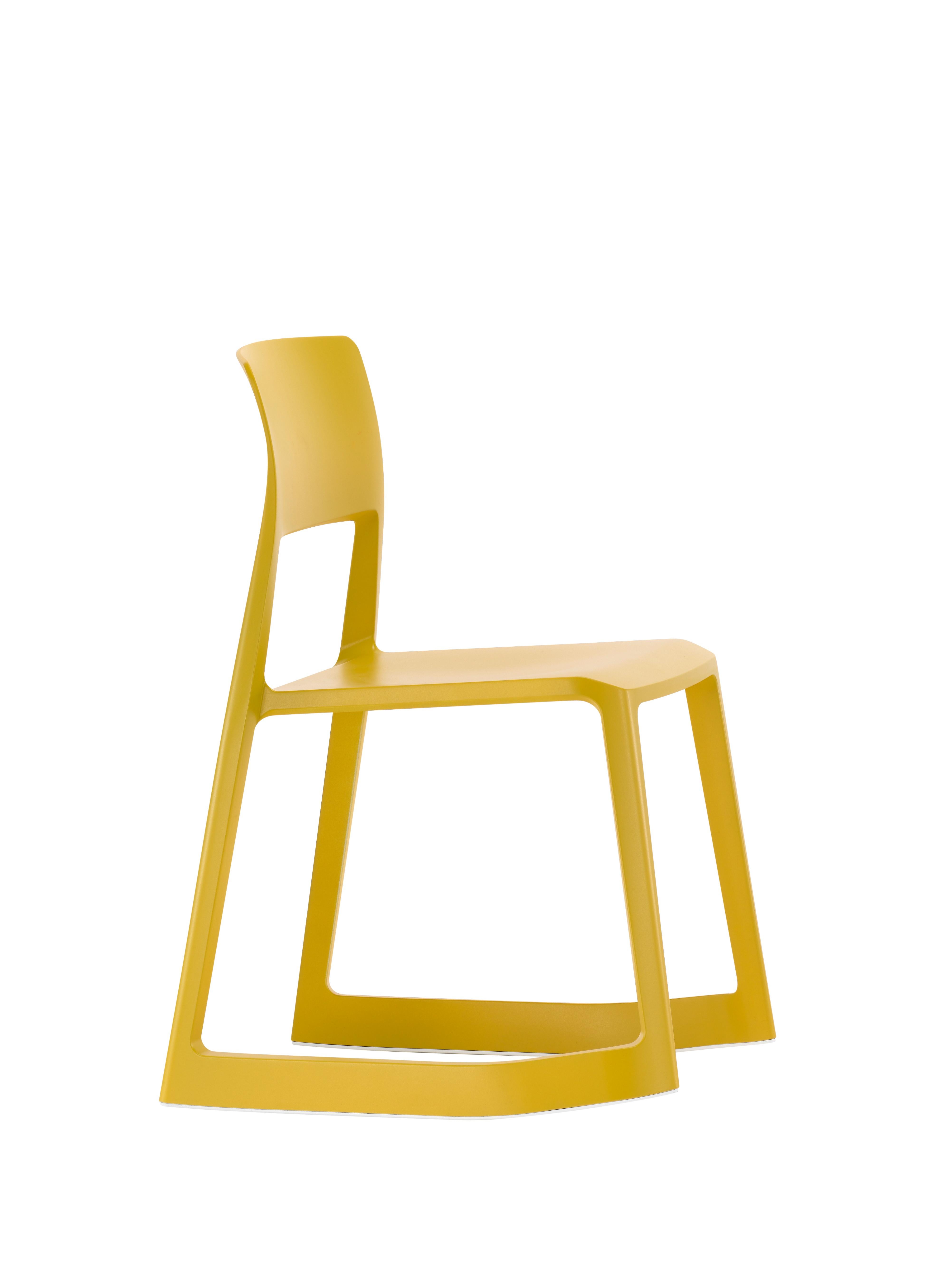 Tip Ton defines a whole new chair typology: the solid plastic chair with forward-tilt action. Its name refers to the characteristic dual sitting postures – from a normal position, Tip Ton can be tilted forward a few degrees where the chair then