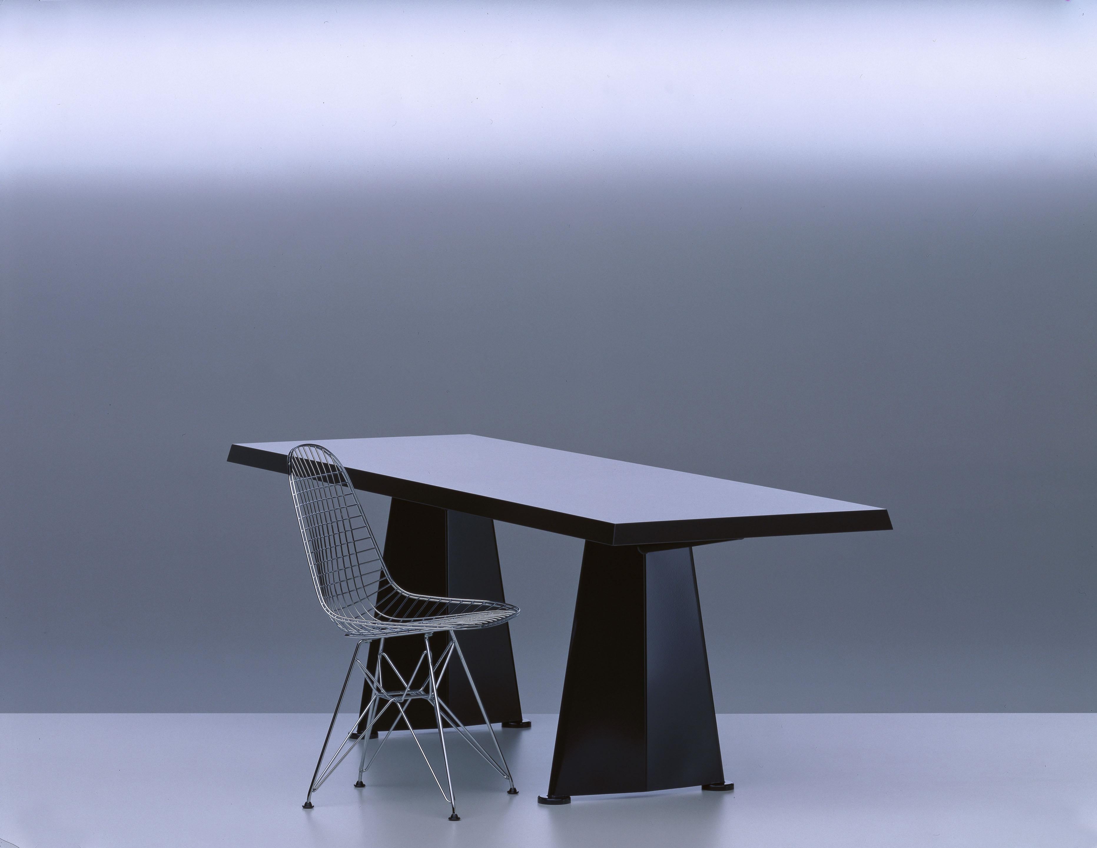 Vitra Trapèze table in black by Jean Prouvé. Like the Antony chair, the Trapèze table was originally developed for the Cité Universitaire in Antony near Paris and numbers among the final pieces created by the French‚ 'constructeur‘ Jean Prouvé in