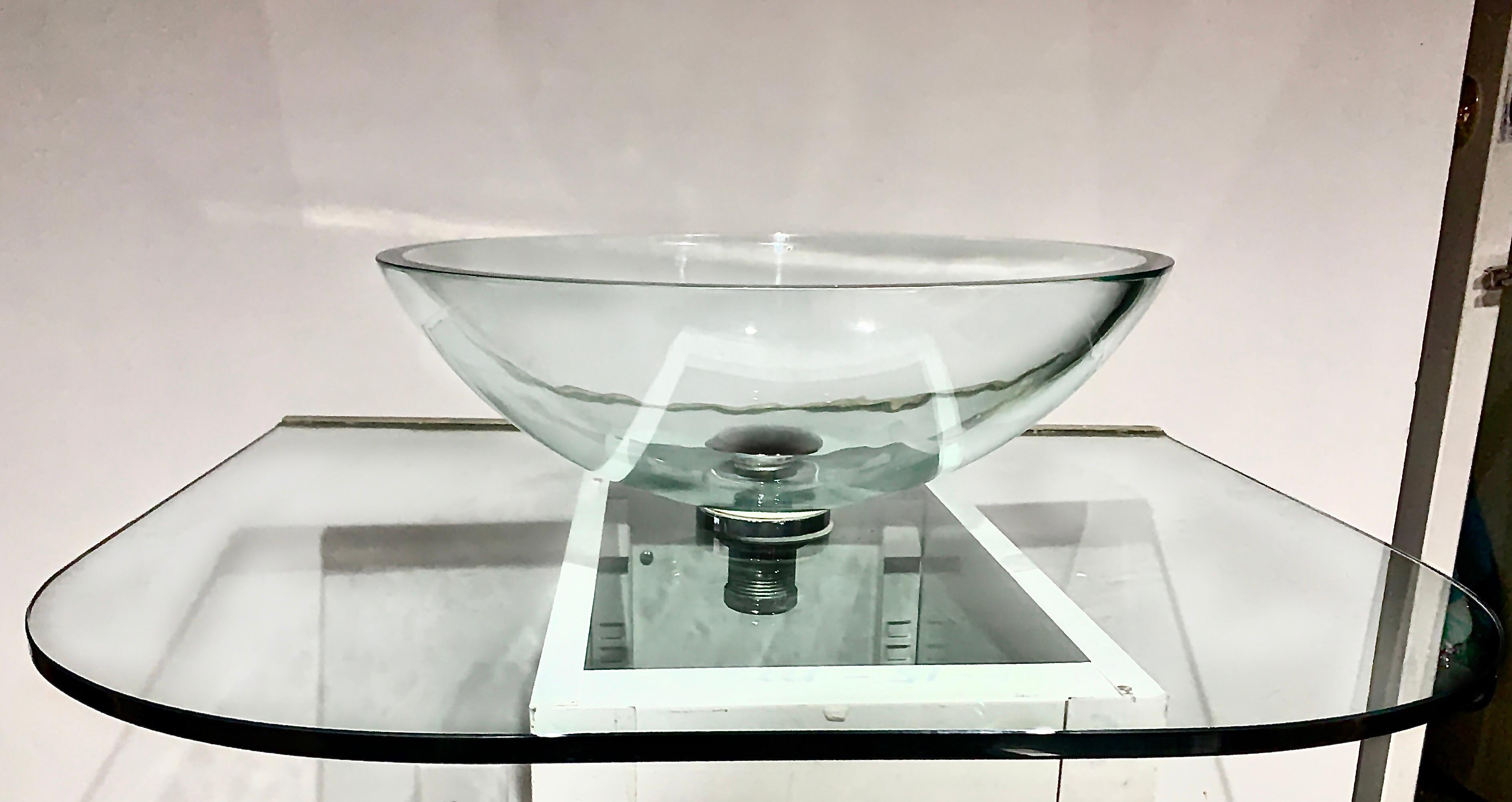 Vitraform large round polished clear vessel sink & rounded clear glass countertop. MSRP for this set is nearly 4400 USD.