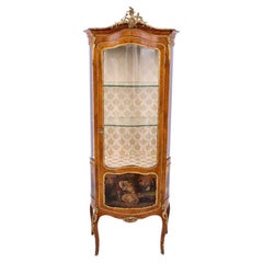 Vitrina de estilo Luis XV, Francia, hacia 1910. Después de la renovación