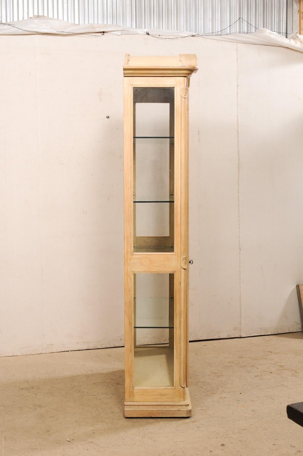 arched glass display cabinet