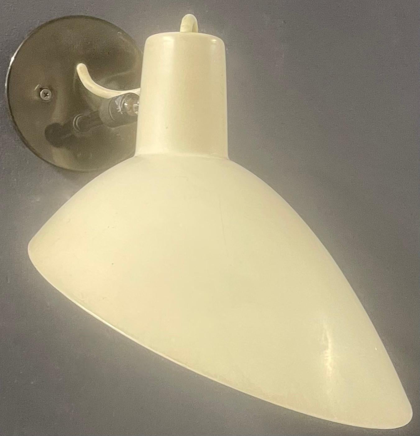 nice wallsconce by arteluce - we can offer a few in various versions...