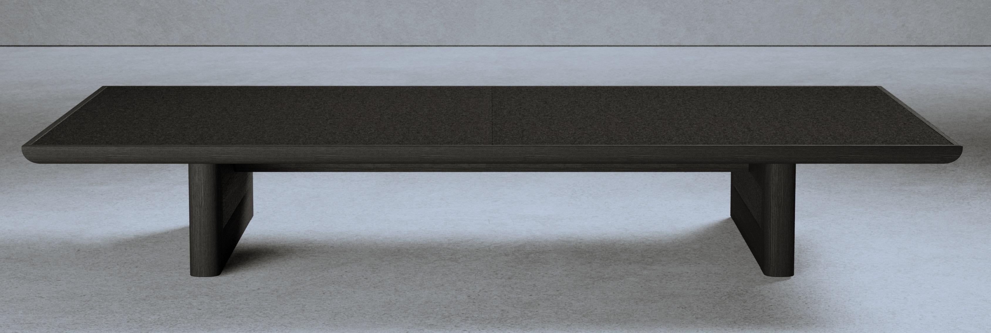 Vittorio 180 Coffee Table by Gio Pagani
Dimensions: D 90 x W 180 x H 28.5 cm.
Materials: Black ash wood and Loro Piana wool.

In a fluid society capable of mixing infinite social and cultural varieties, the nostalgic search for reworked aesthetics