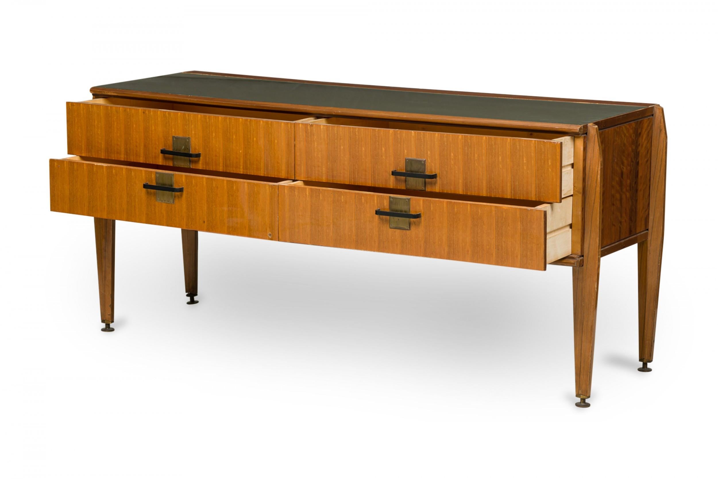 Italian Mid-Century Modern 4-drawer chest with a lightly vertically striped fruitwood veneer, with bronze and ebonized drawer pulls and a muted green glass top, resting on four tapered square legs ending in adjustable metal feet. (VITTORIO DASSI)