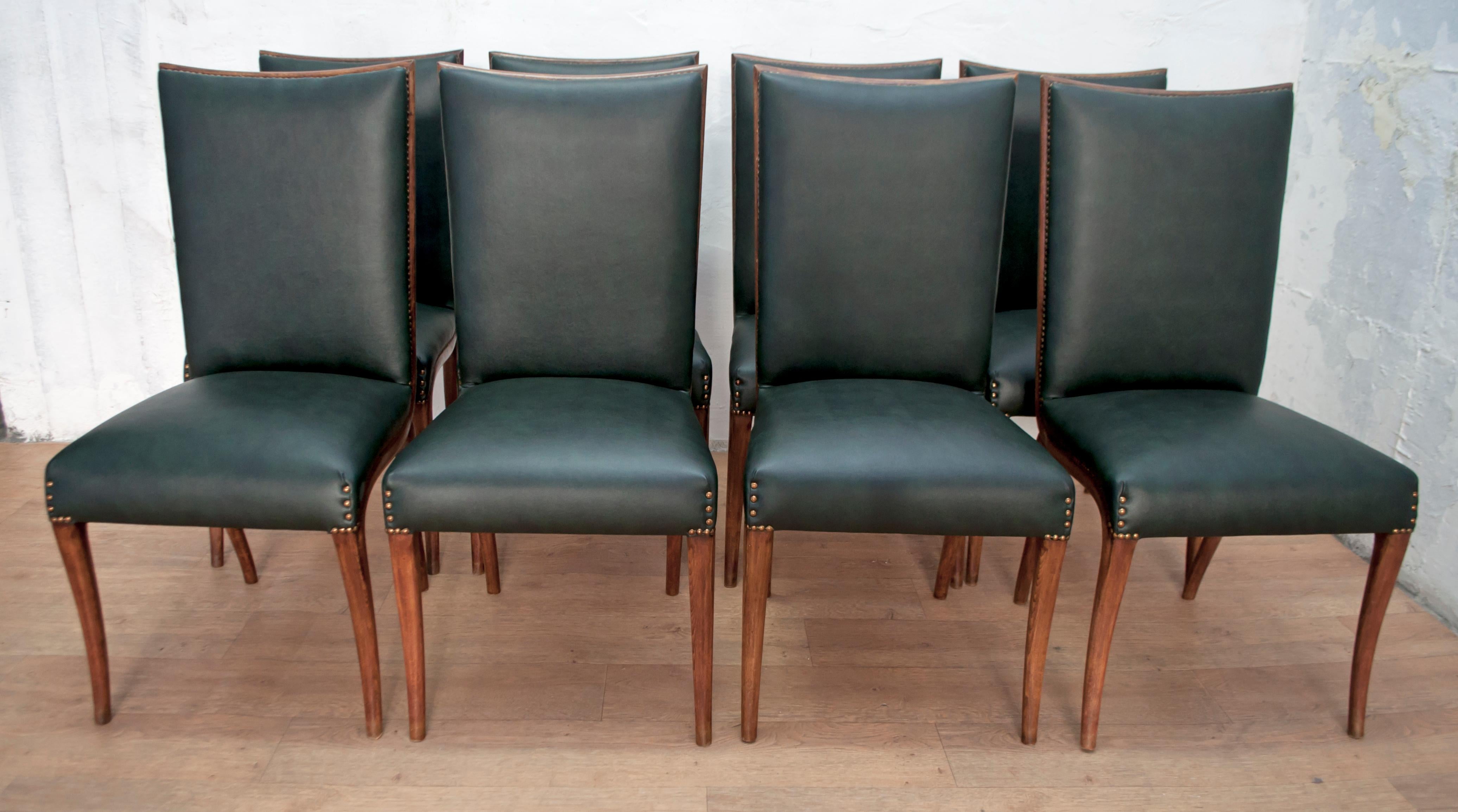 These eight dining chairs were designed by the famous Italian design Vittorio Dassi, Italia, 1950.
The chairs have been partially restored, the upholstery has been redone in green eco-leather, as it was originally.
 