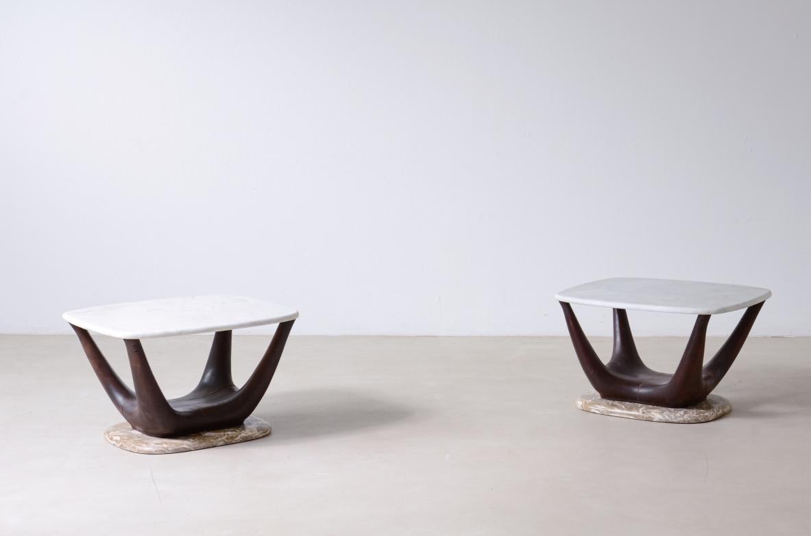 
COD-2842
Vittorio Dassi (1893-1973)

Pair of organic shaped coffee tables with marble top and base.

Manufactured by Dassi Turin, ca.1930/40s.

Vittorio Dassi, a key figure in the renewal of Italian design in the 1930s, collaborated with luminaries