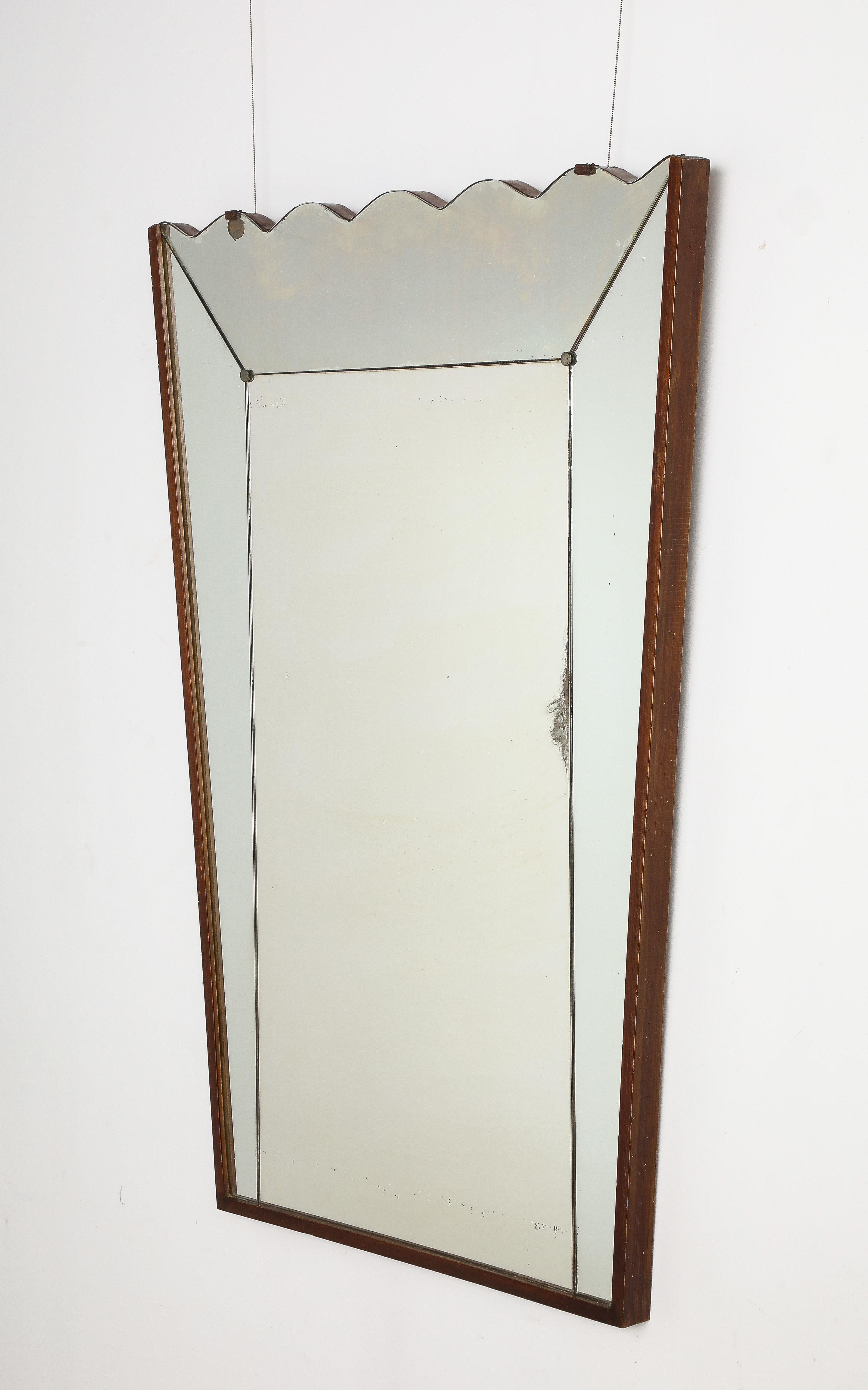 Vittorio Dassi Wood and Scalloped Wall Mirror, Italy circa late 1940's 

A highly unique and decorative wall mirror features a straight walnut frame on the sides and base which highlights the delicate scalloped pattern at the top which runs the
